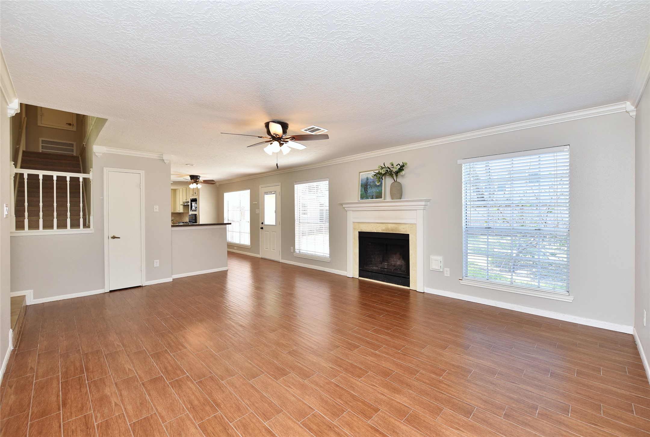 The family room is open to the kitchen area. The family room is open to the kitchen area.
