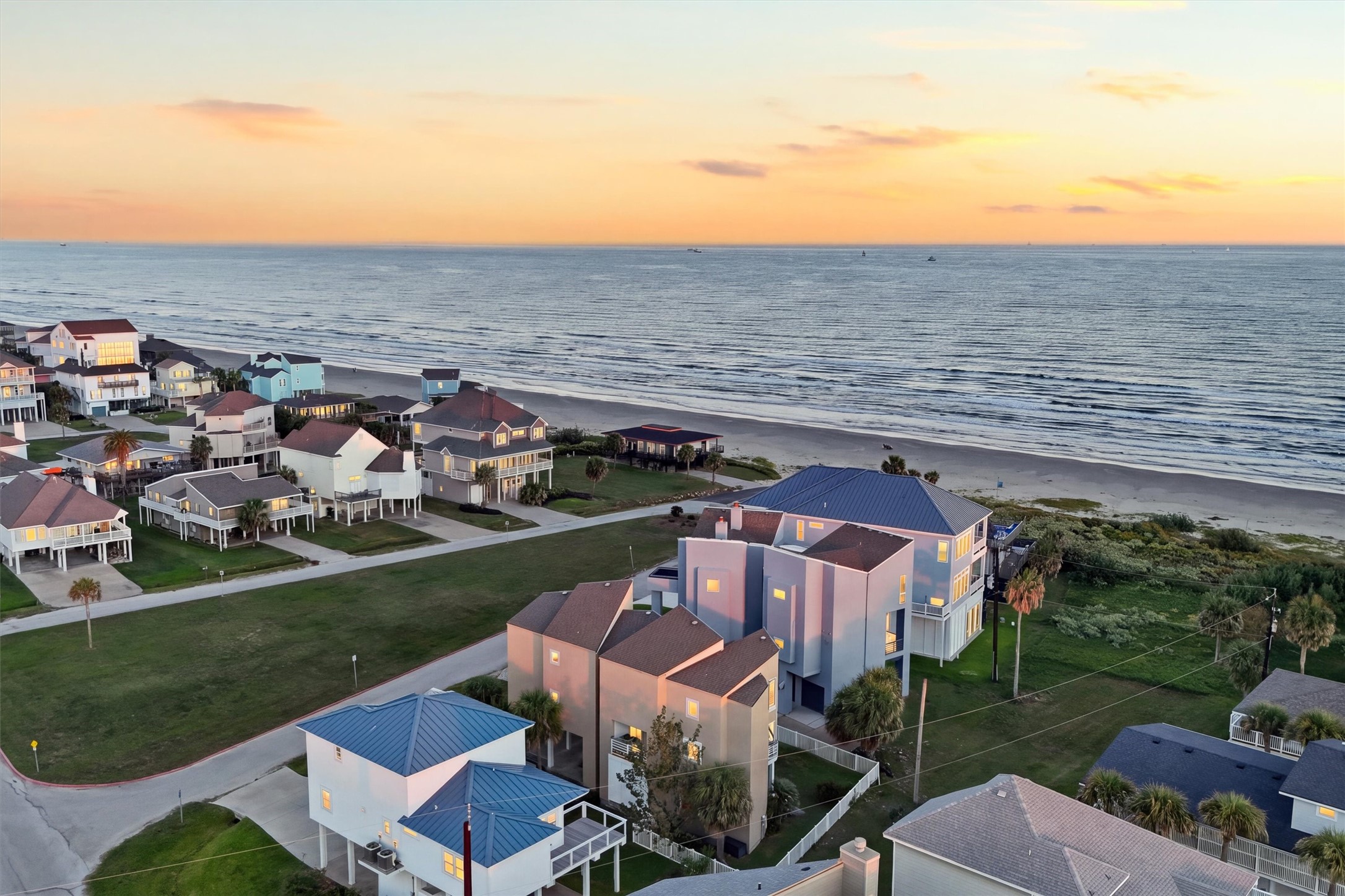 Imagine trading your daily routine for sandy strolls and rolling waves. This aerial perspective captures the homes close connection to the shore, where spontaneous beach days become part of everyday life. Imagine trading your daily routine for sandy strolls and rolling waves. This aerial perspective captures the homes close connection to the shore, where spontaneous beach days become part of everyday life.