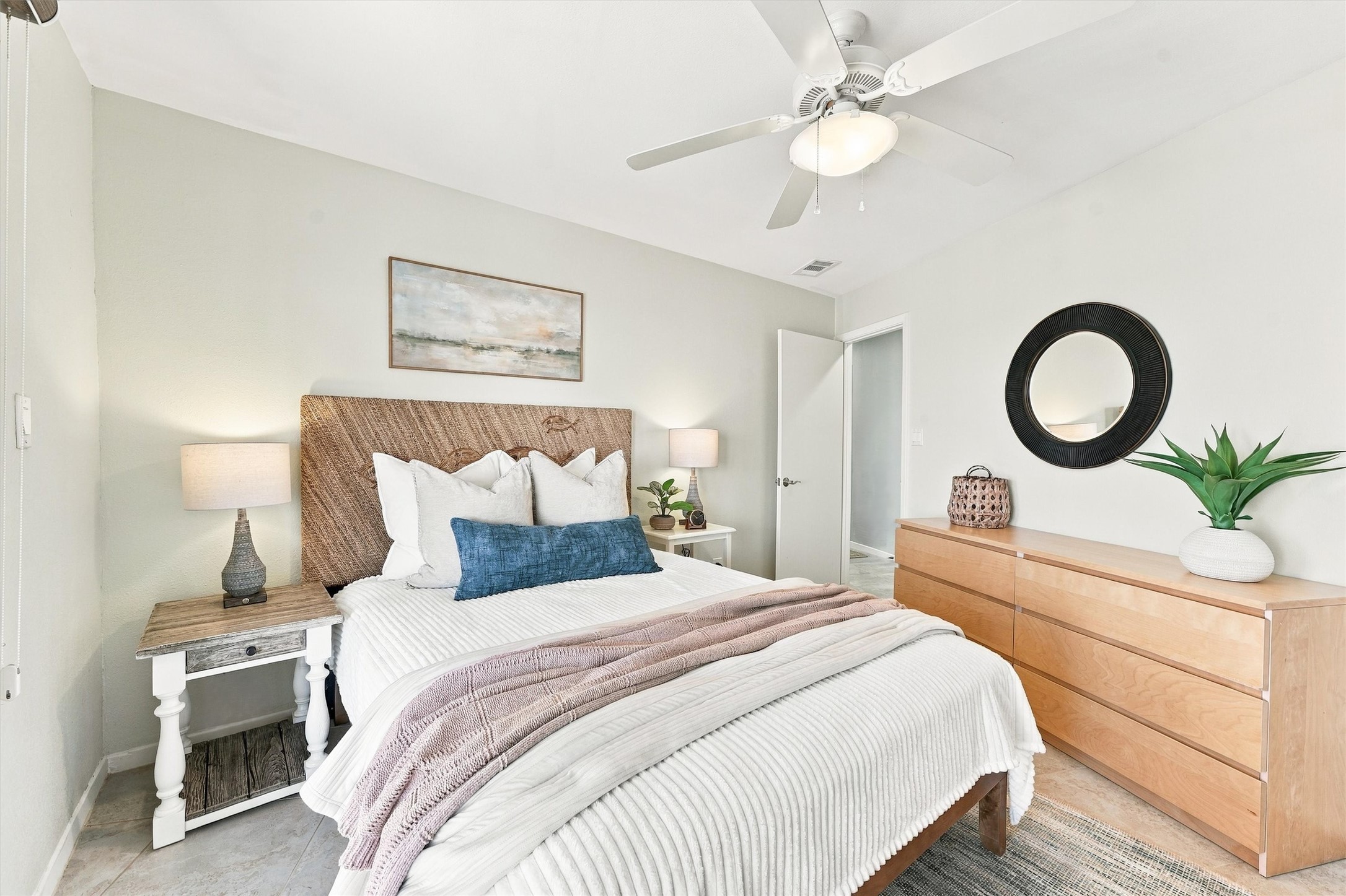 After a day of sunshine and sandy toes, recharge in a bedroom filled with warm textures and soothing colors.