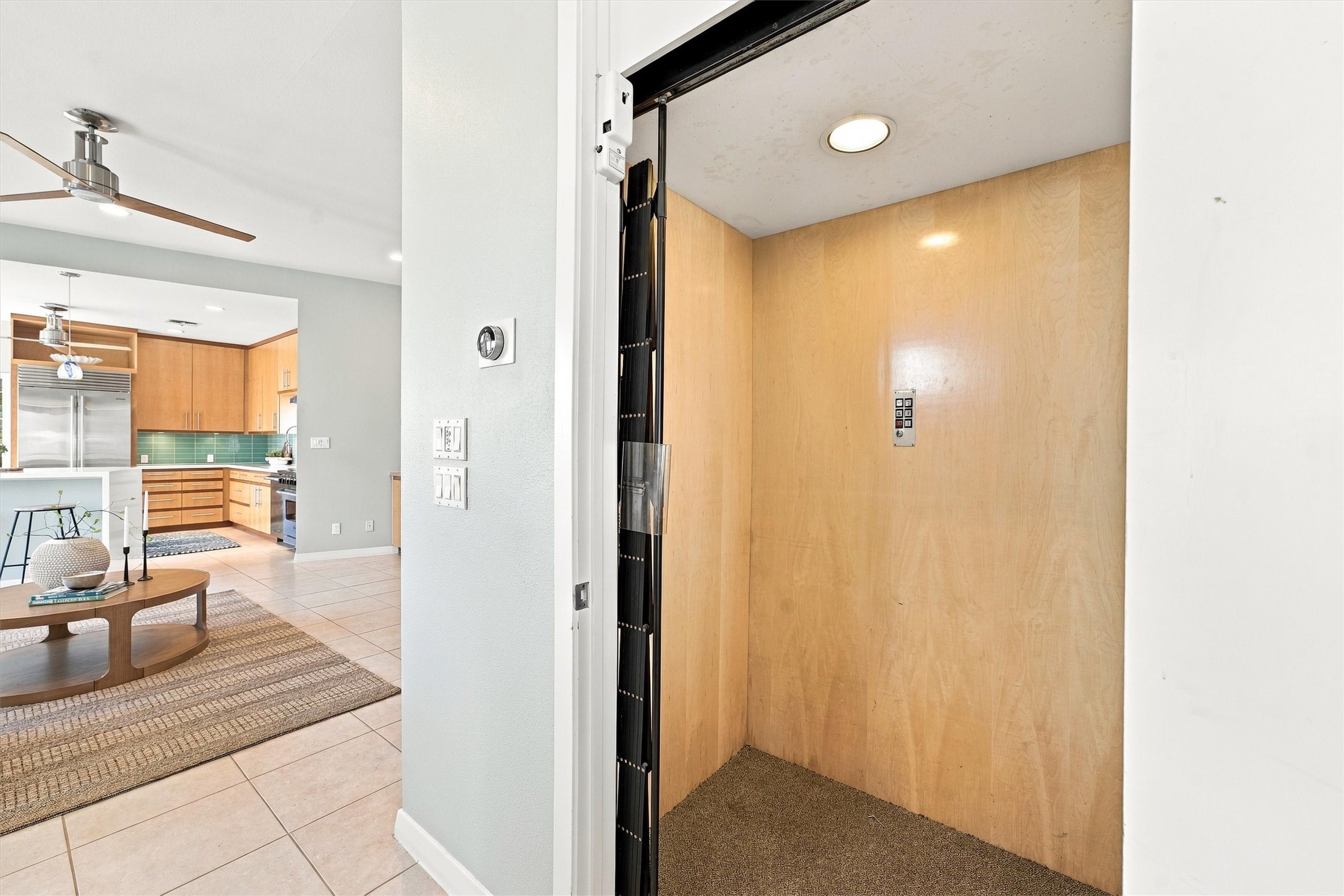 From bringing in groceries to heading upstairs for an evening with friends, the homes elevator makes moving between floors effortlessenjoy the views! From bringing in groceries to heading upstairs for an evening with friends, the homes elevator makes moving between floors effortlessenjoy the views!