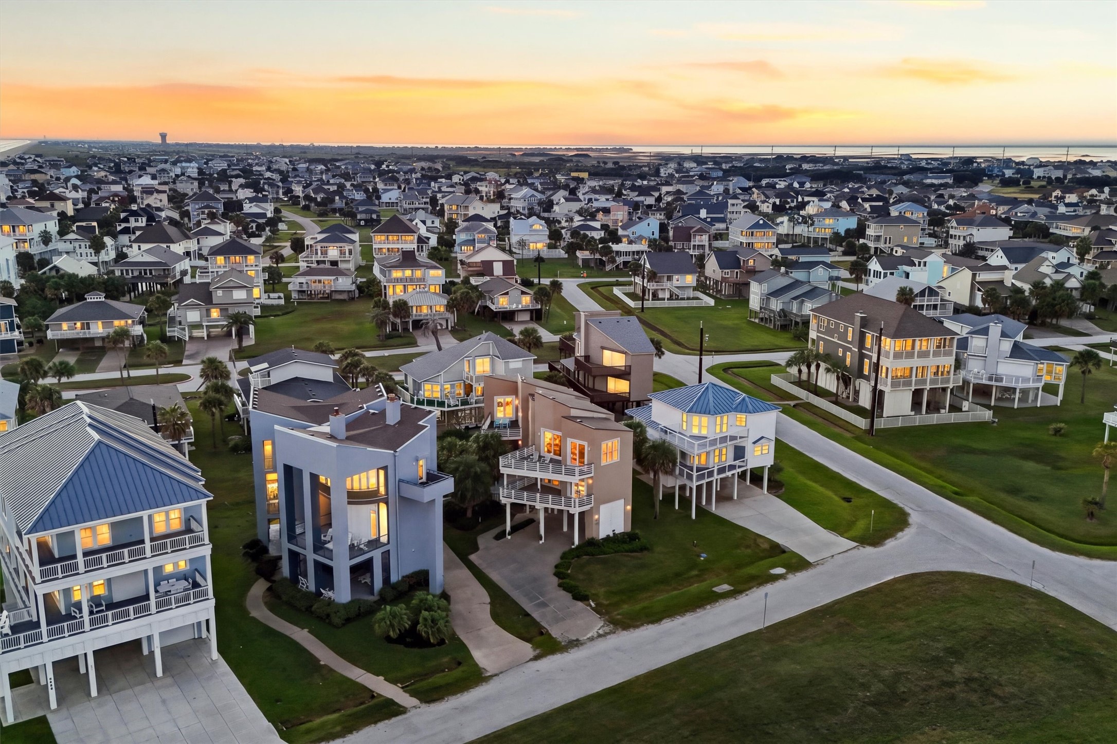 Watch the sunrise over the beach and the sunset over the bay!
