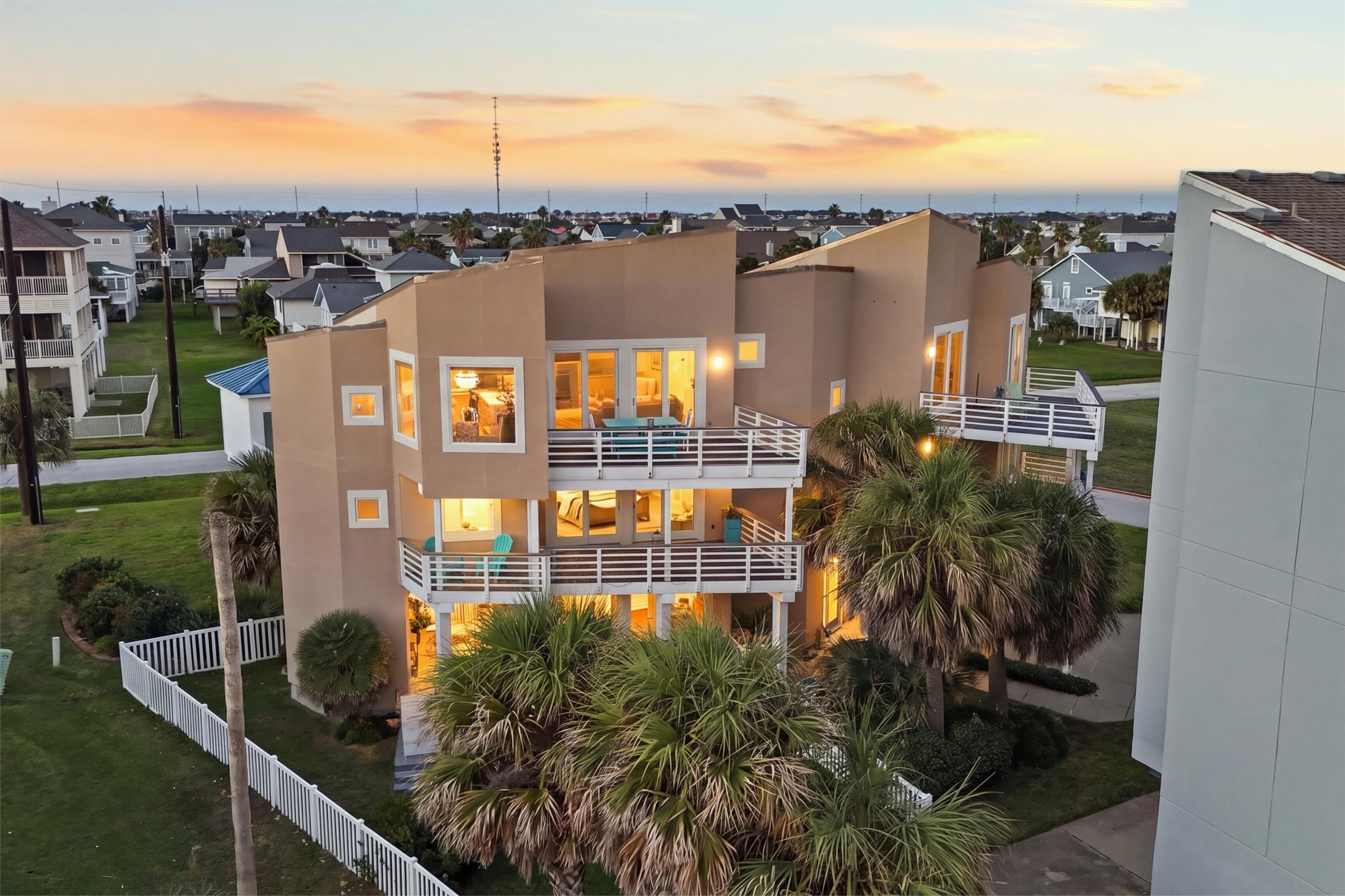 Four inviting balconies set the scene for relaxed evenings just steps from the beach. Four inviting balconies set the scene for relaxed evenings just steps from the beach.