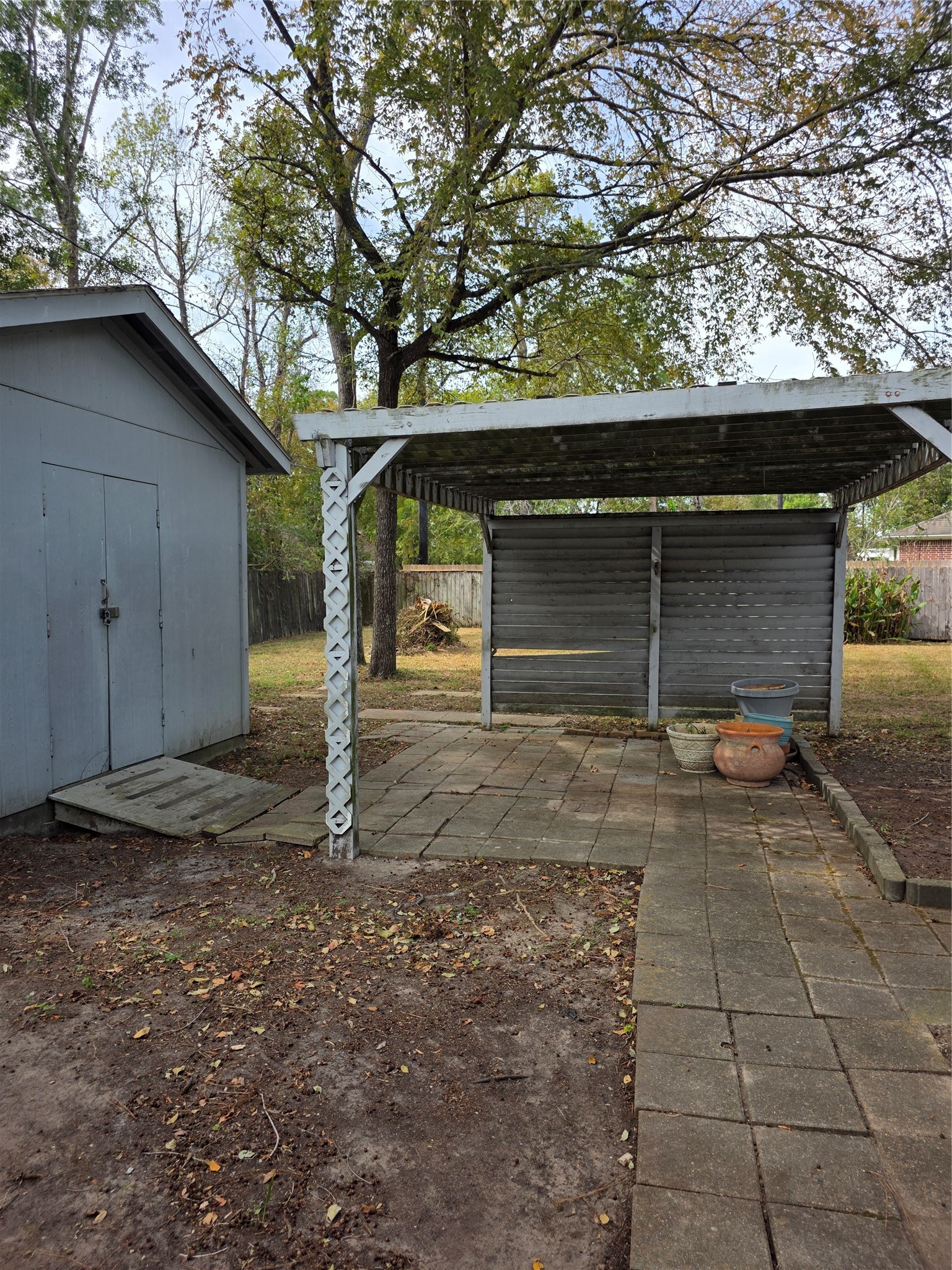Cement walkway to Workshop and additional yard space