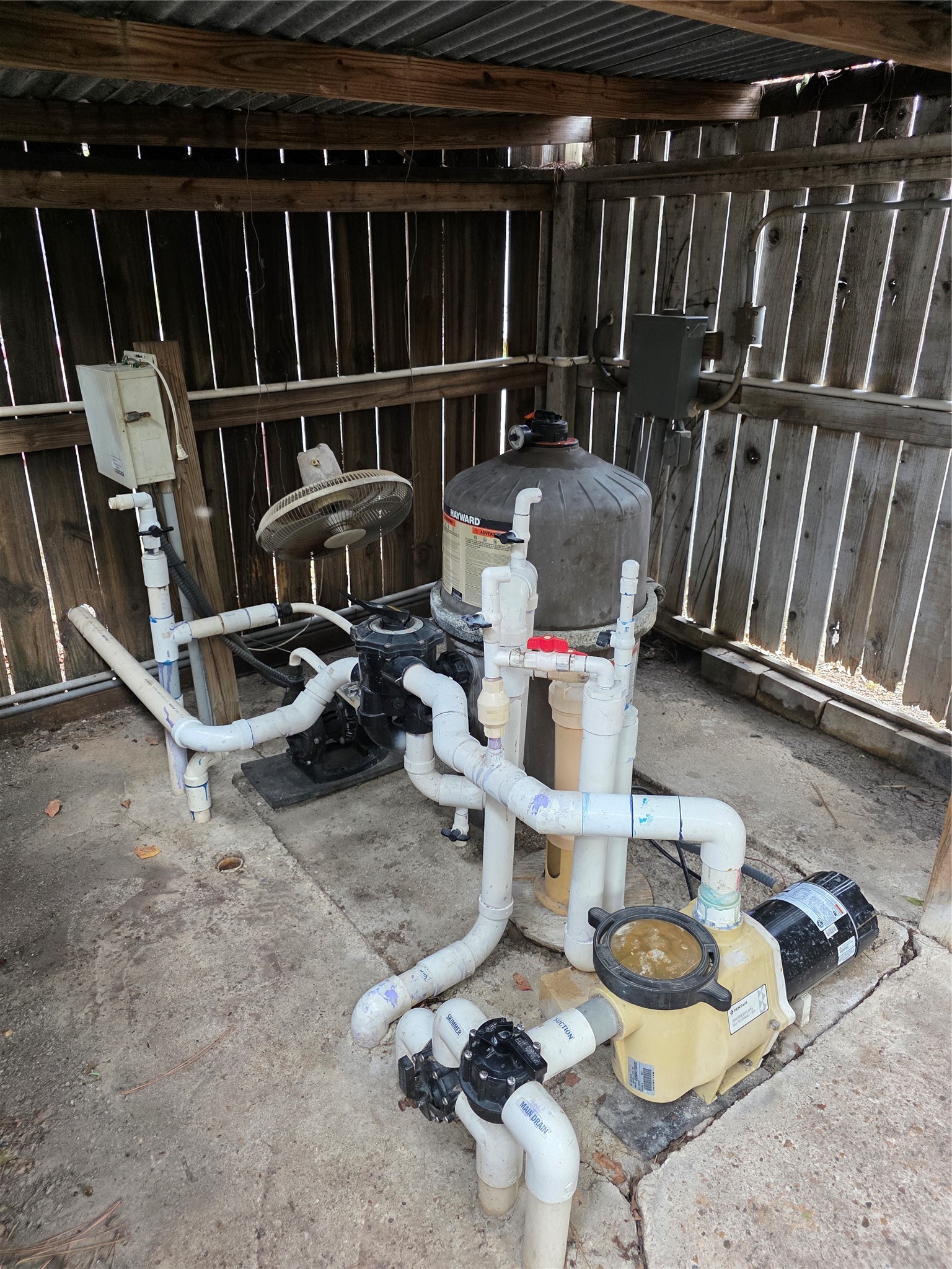 Pool pump system in it's own covered shed