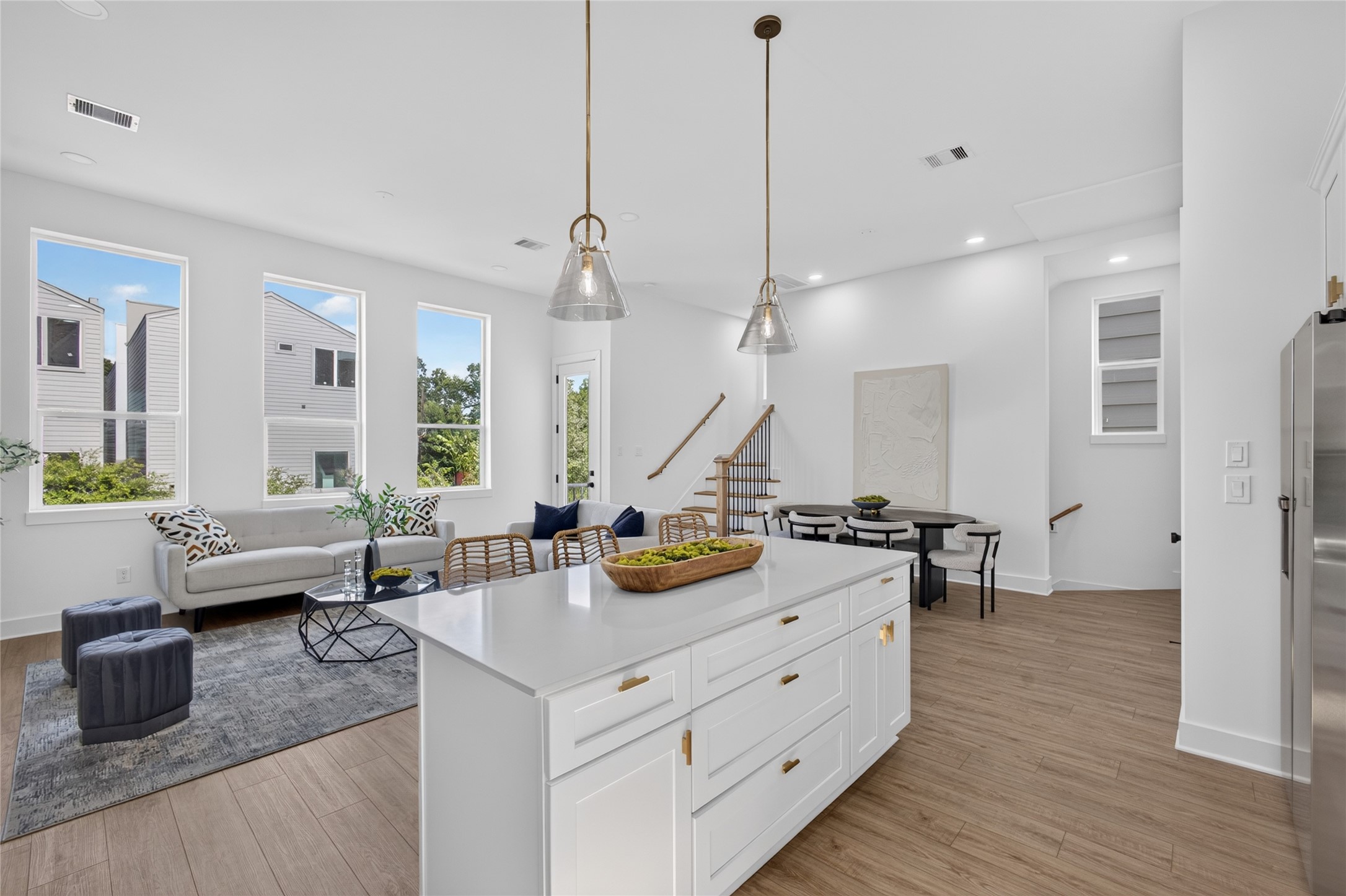 Spacious open concept kitchen with a large center island, generous storage, and premium finishes throughout.
