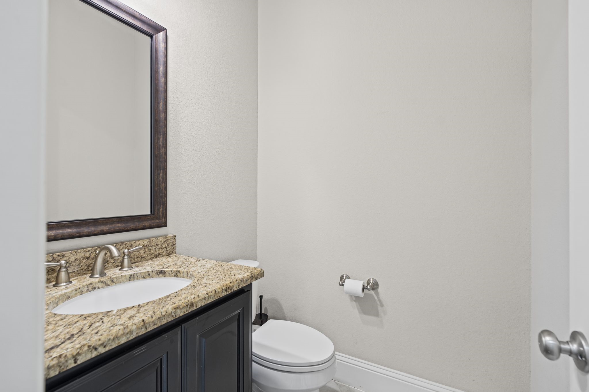 A conveniently located downstairs powder bath