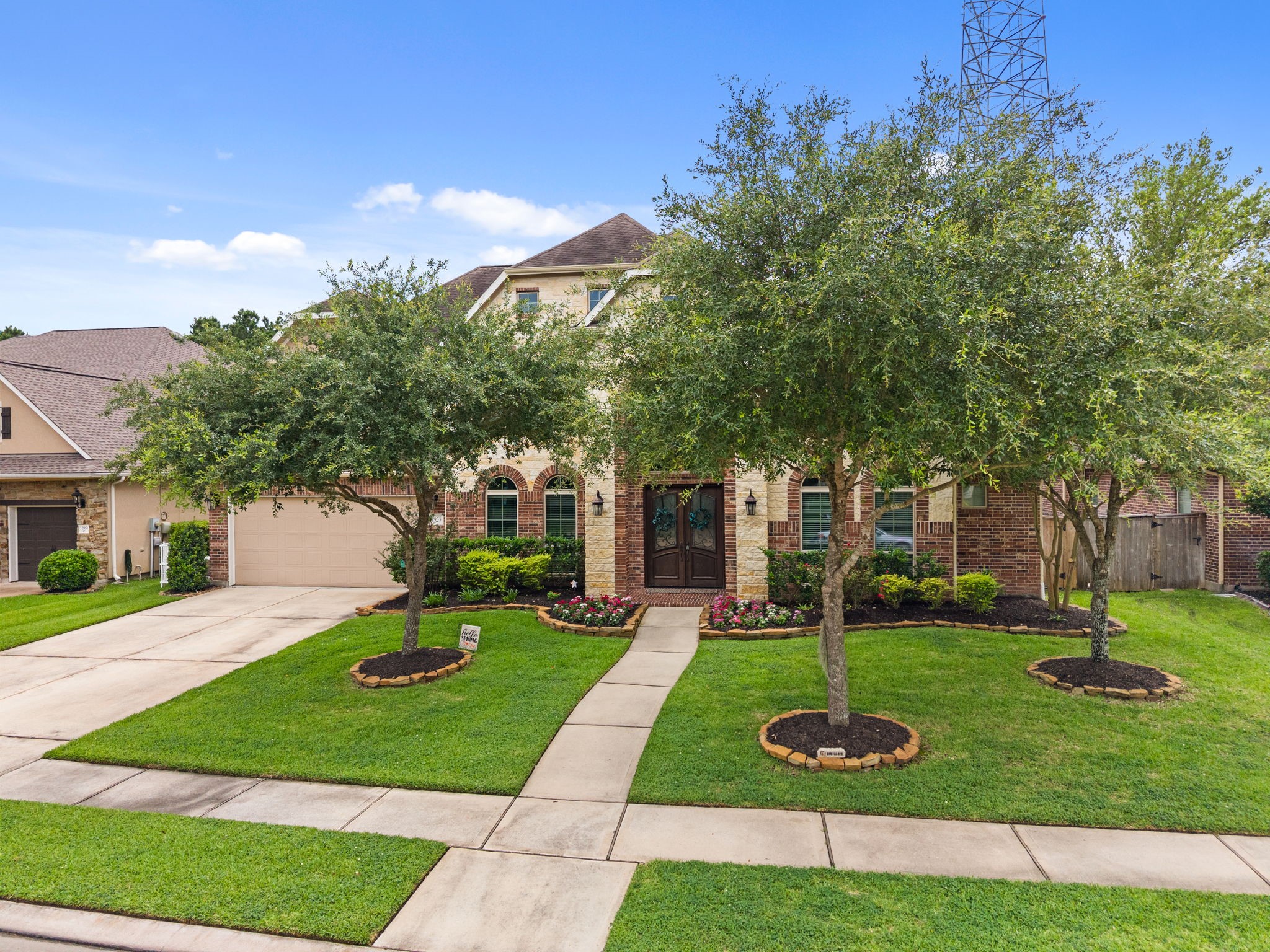 Three-car garage offering additional storage and convenience