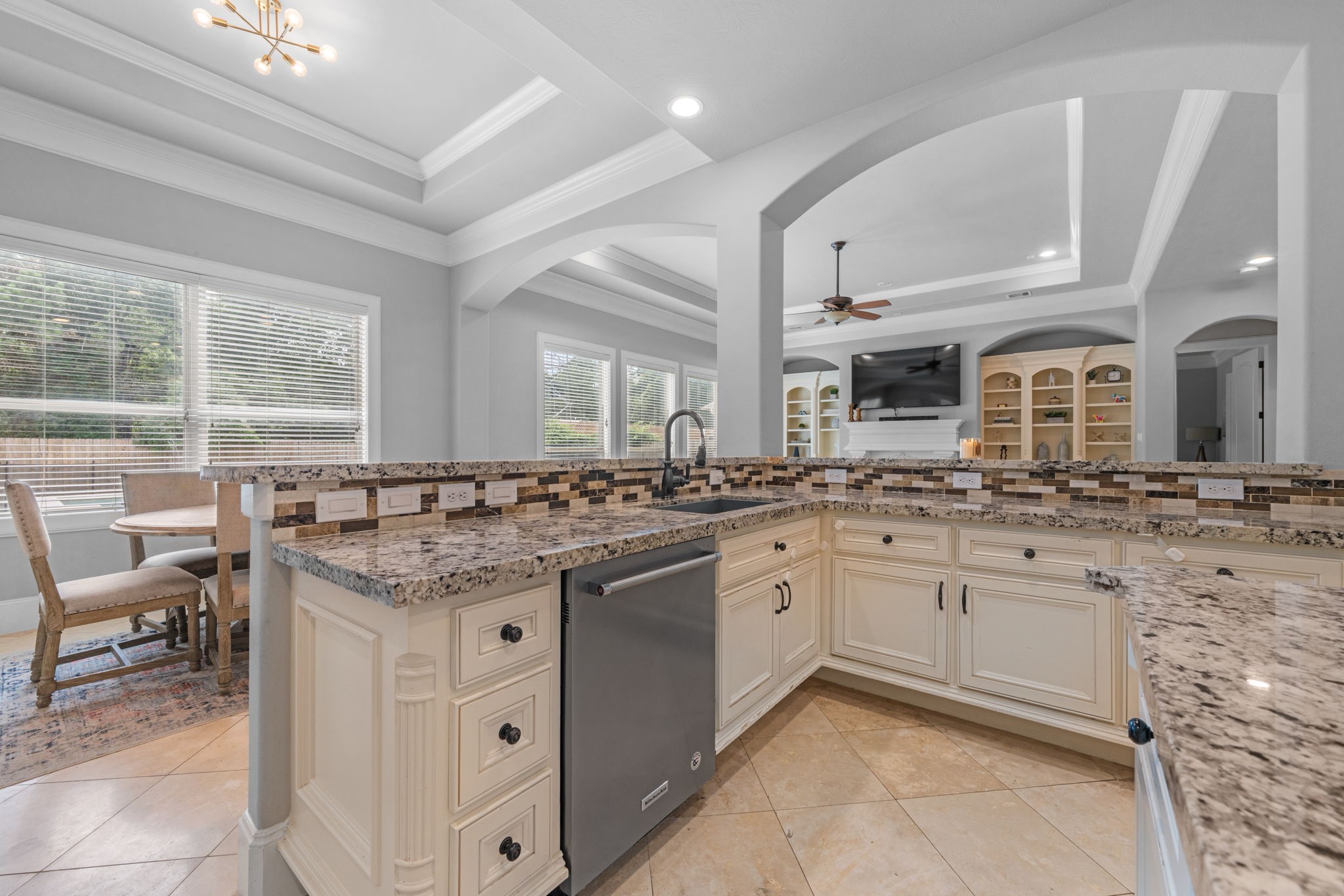 Wrap around bar is perfect to gather around the kitchen