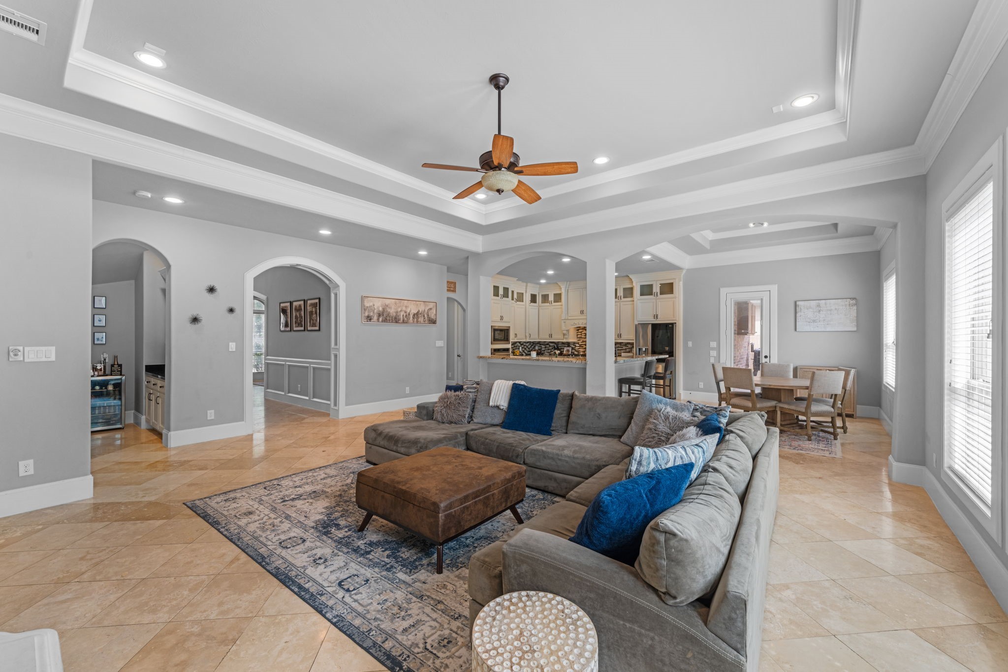 Spacious living room filled with natural light and overlooking the backyard retreat Spacious living room filled with natural light and overlooking the backyard retreat