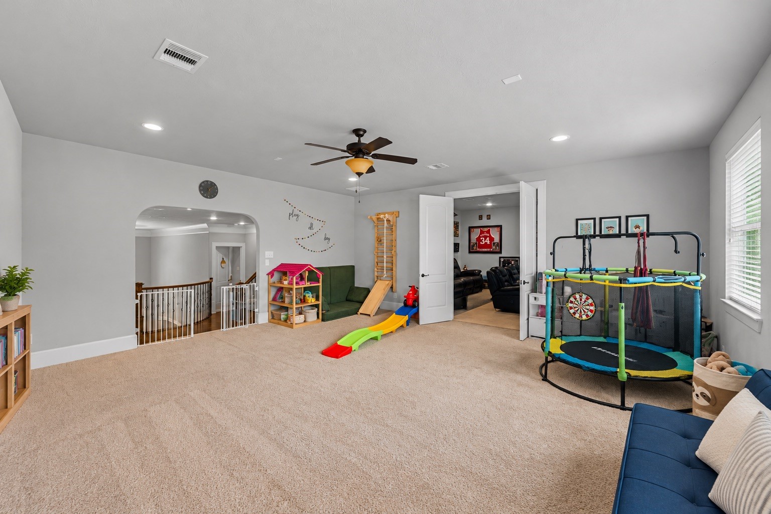 Upstairs game room and media room offering flexible space for entertaining, play, or relaxing Upstairs game room and media room offering flexible space for entertaining, play, or relaxing
