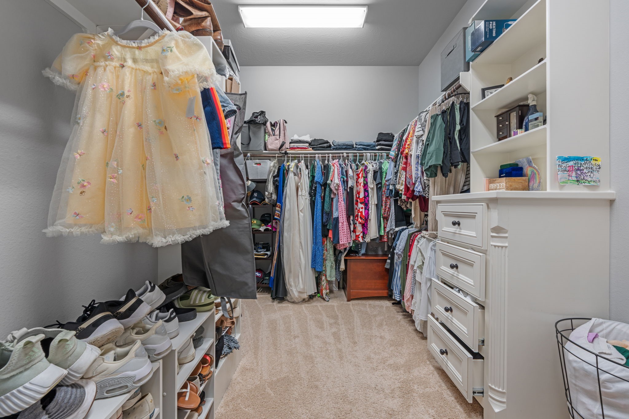 Dual walk-in closets provide exceptional organization and convenience