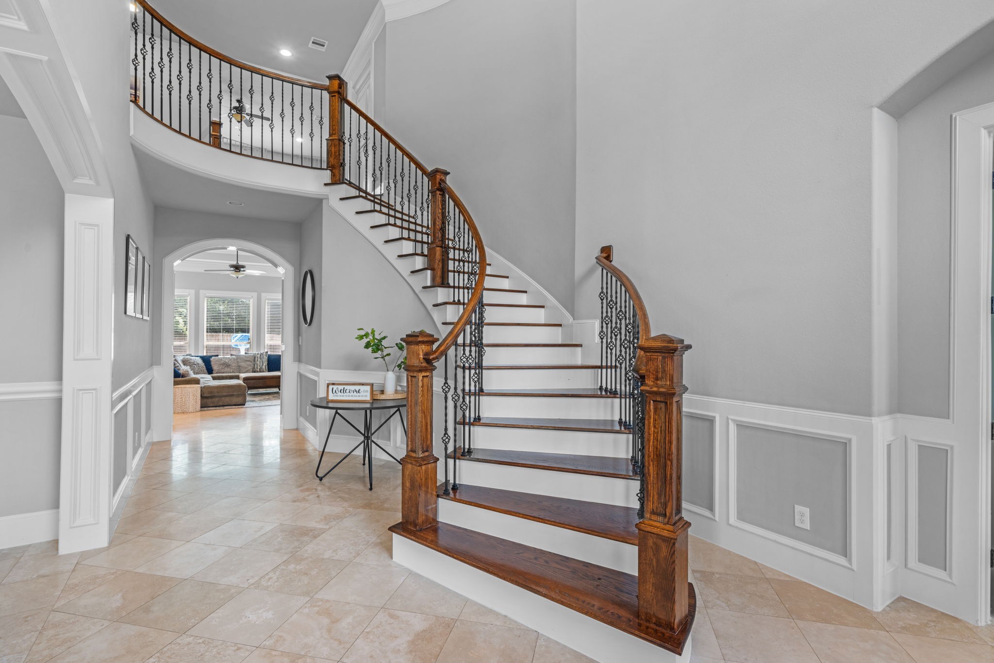 Grand foyer with soaring ceilings creating an impressive first impression Grand foyer with soaring ceilings creating an impressive first impression