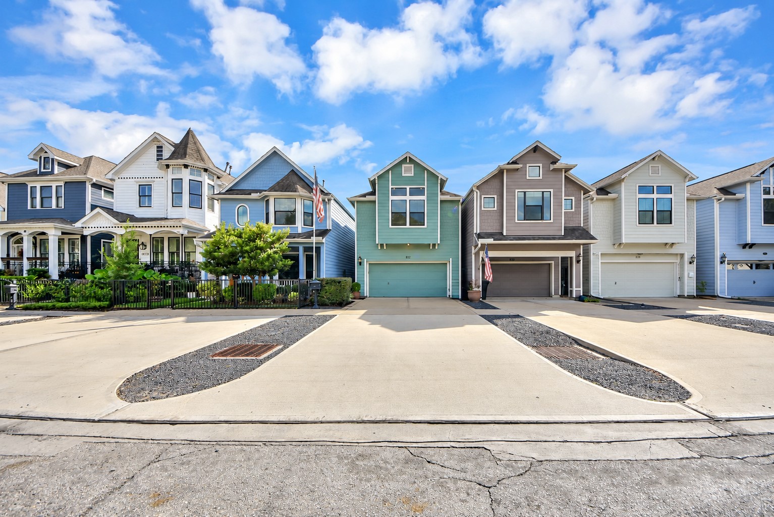 Wide and long driveway that can easily fit 4 cars.