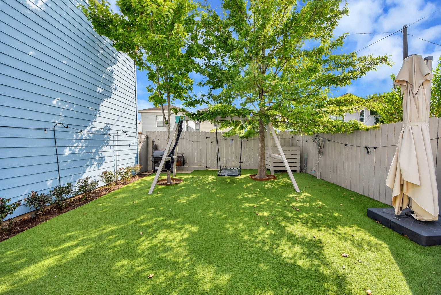 Artificial turf for low maintenance.