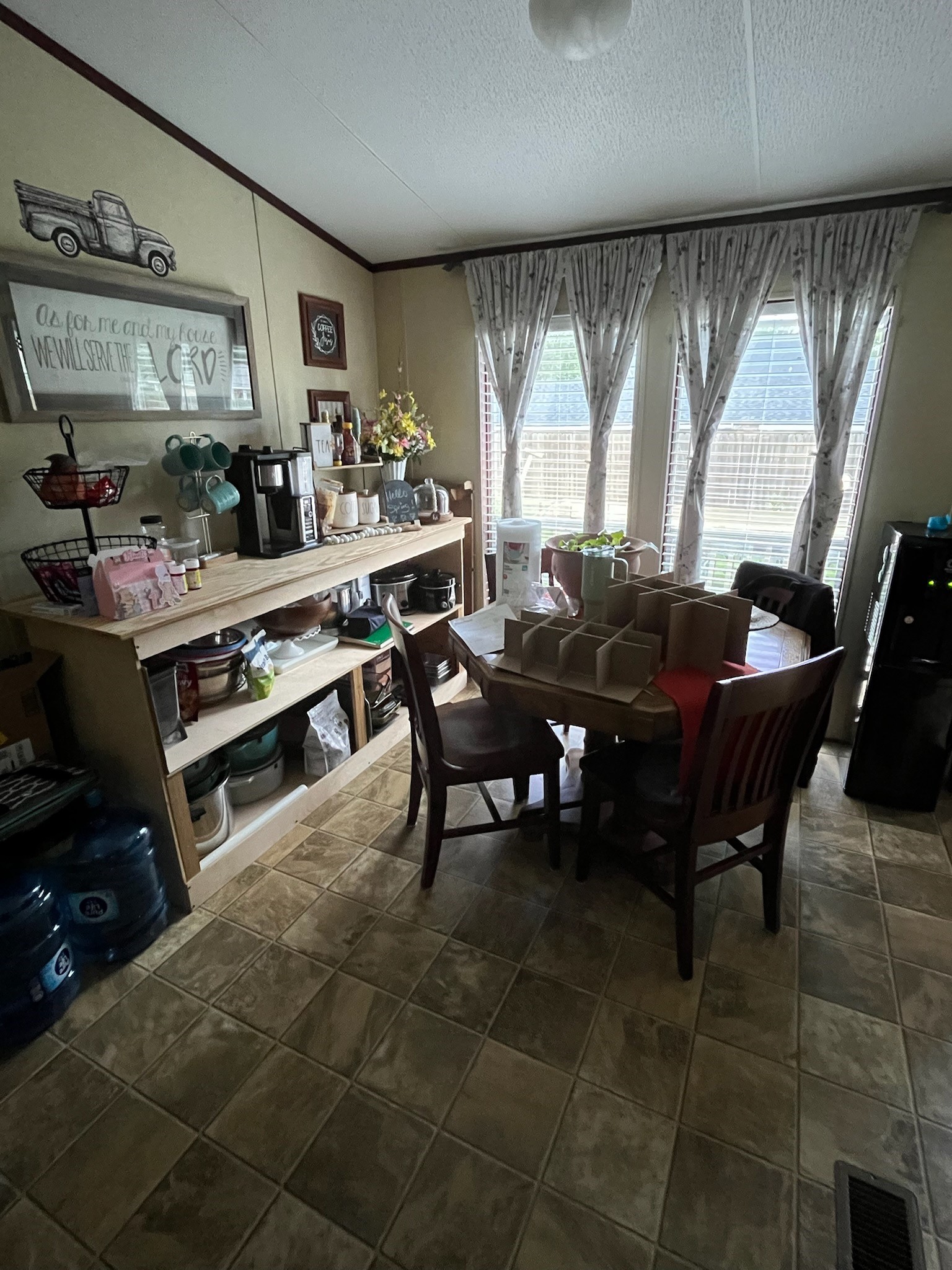 The dining area has natural light and is large enough for a 4-6 person dining table.