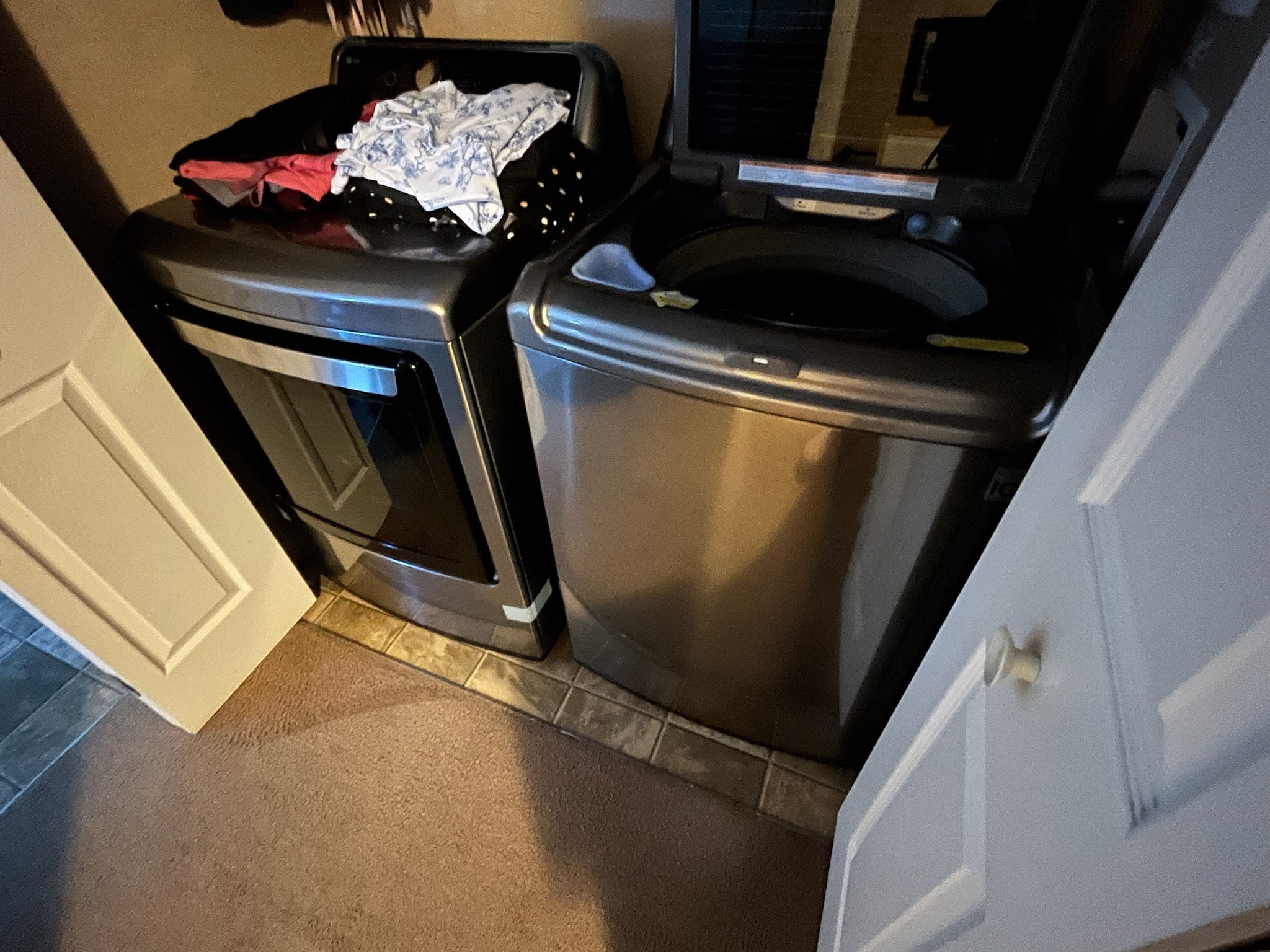 Washer and dryer are located in the home.