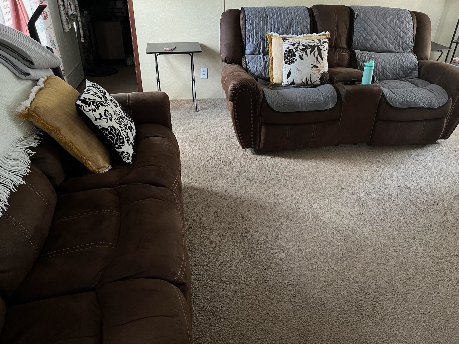 The living room has plenty of space for comfortable living.