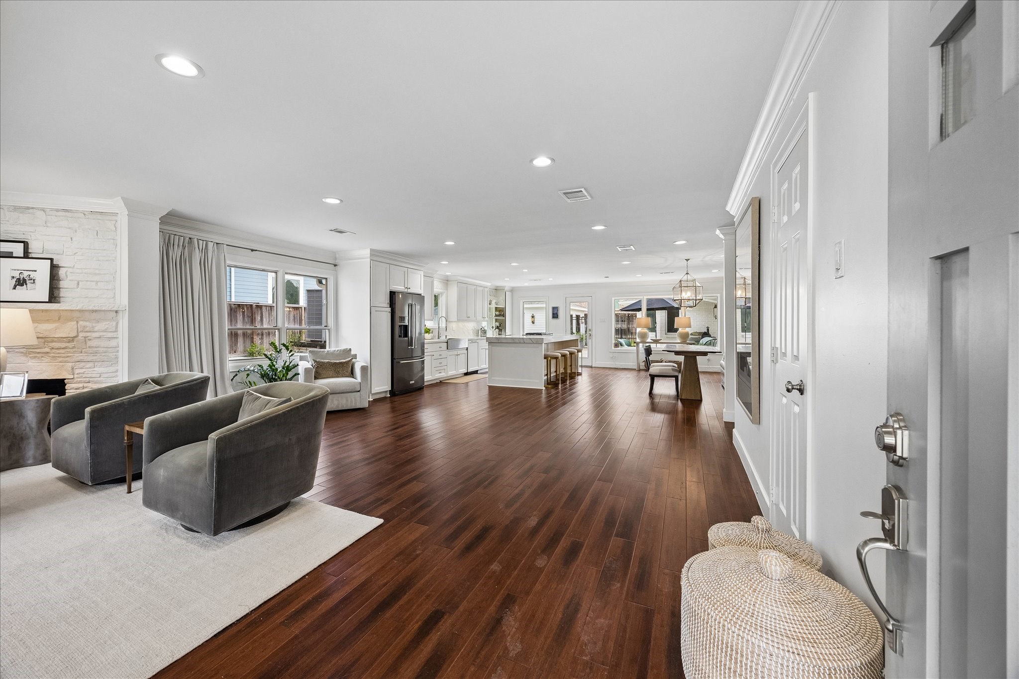 Entryway showcasing the open concept and large spaces that can serve as a play space for kiddos or dining space. Entryway showcasing the open concept and large spaces that can serve as a play space for kiddos or dining space.
