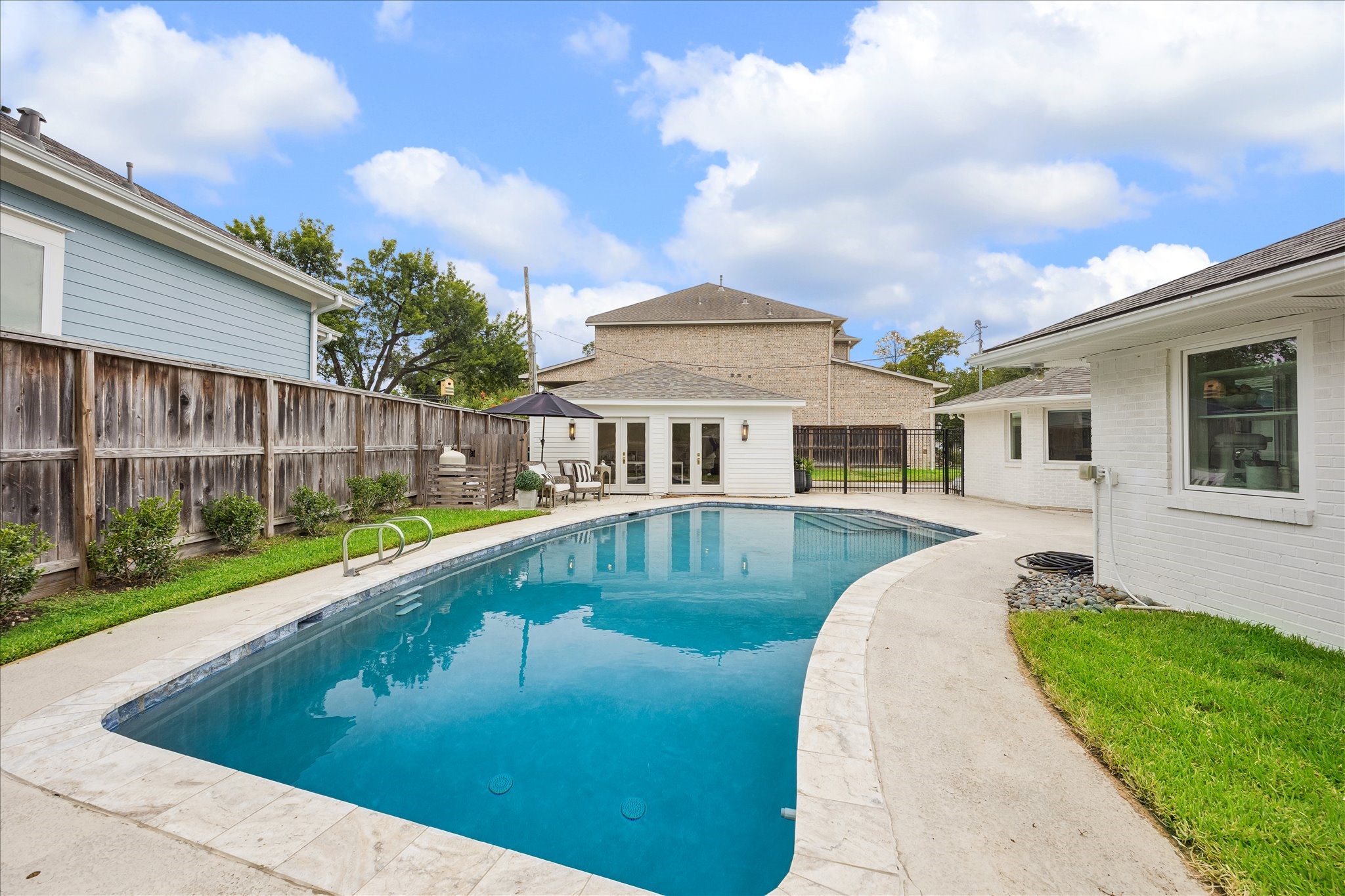 Over the past year, the Sellers re-plastered swimming pool, replaced pool decking, painted the concrete decking and enhanced the landscaping as well as converting the garage into a pool house/guest quarters (496 sf) with full bath and large closet. Over the past year, the Sellers re-plastered swimming pool, replaced pool decking, painted the concrete decking and enhanced the landscaping as well as converting the garage into a pool house/guest quarters (496 sf) with full bath and large closet.