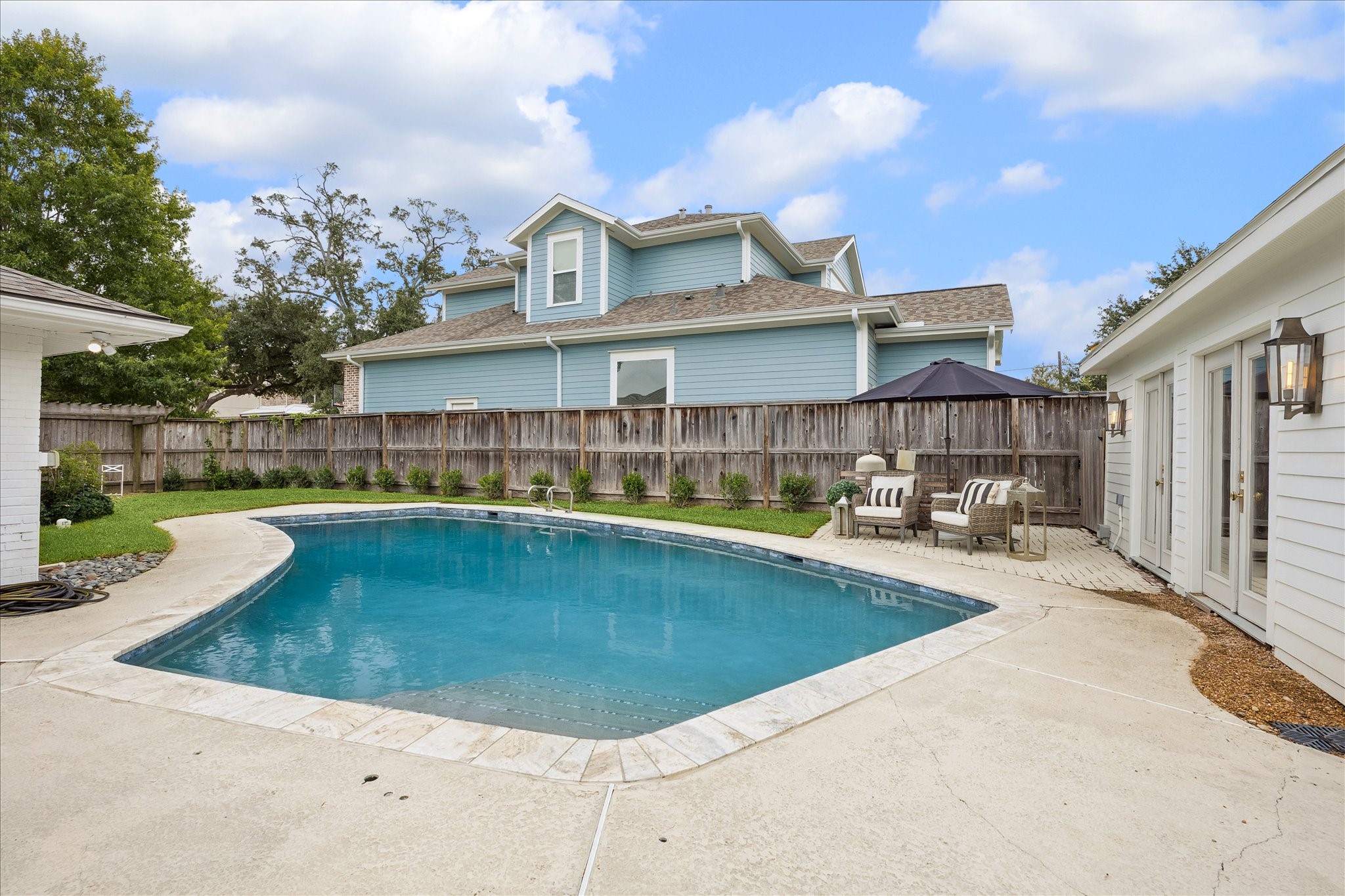 Safety pool fence not pictured but conveys with sale of home.