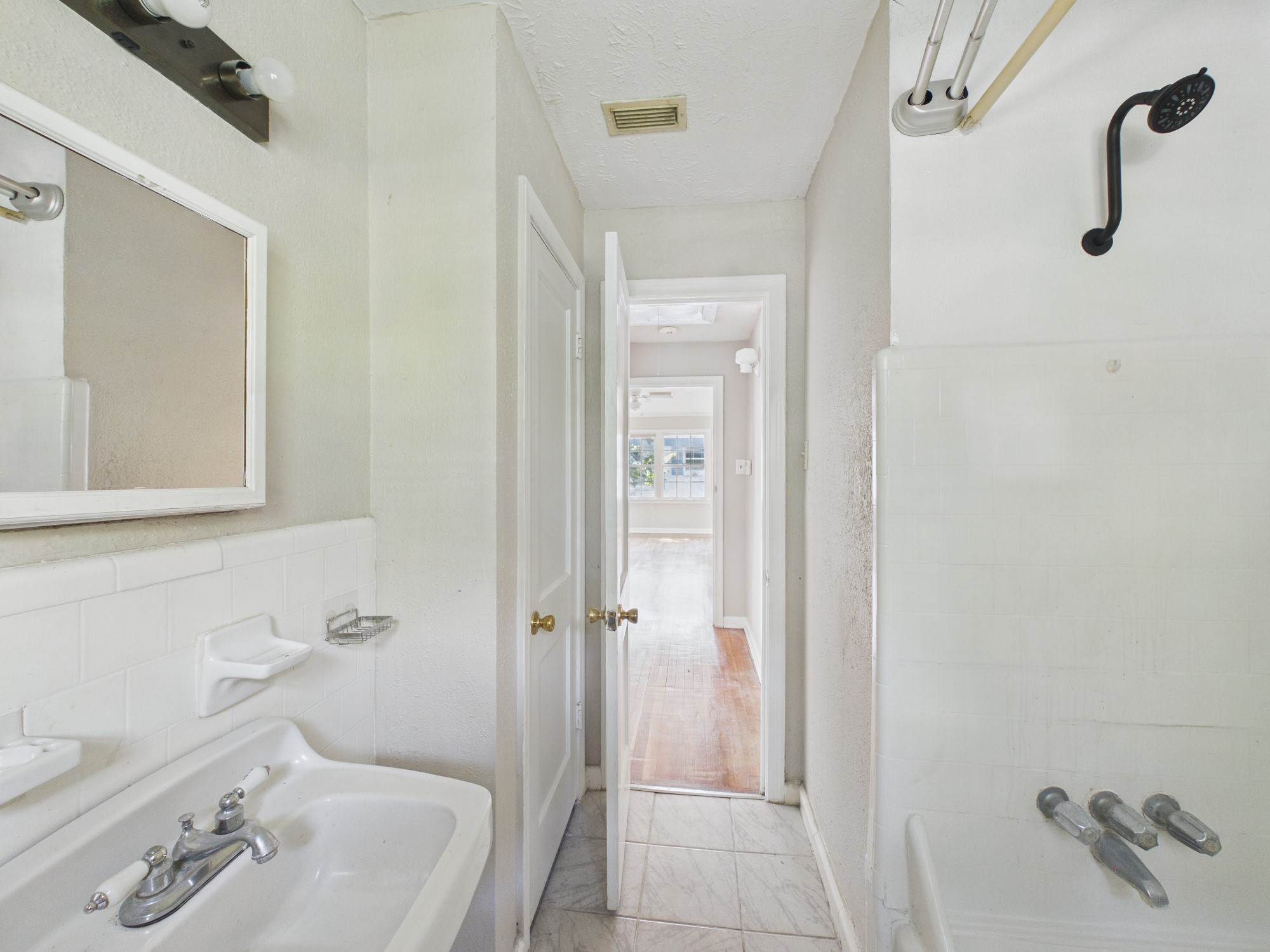 Tub/Shower Combo & Linen Closet