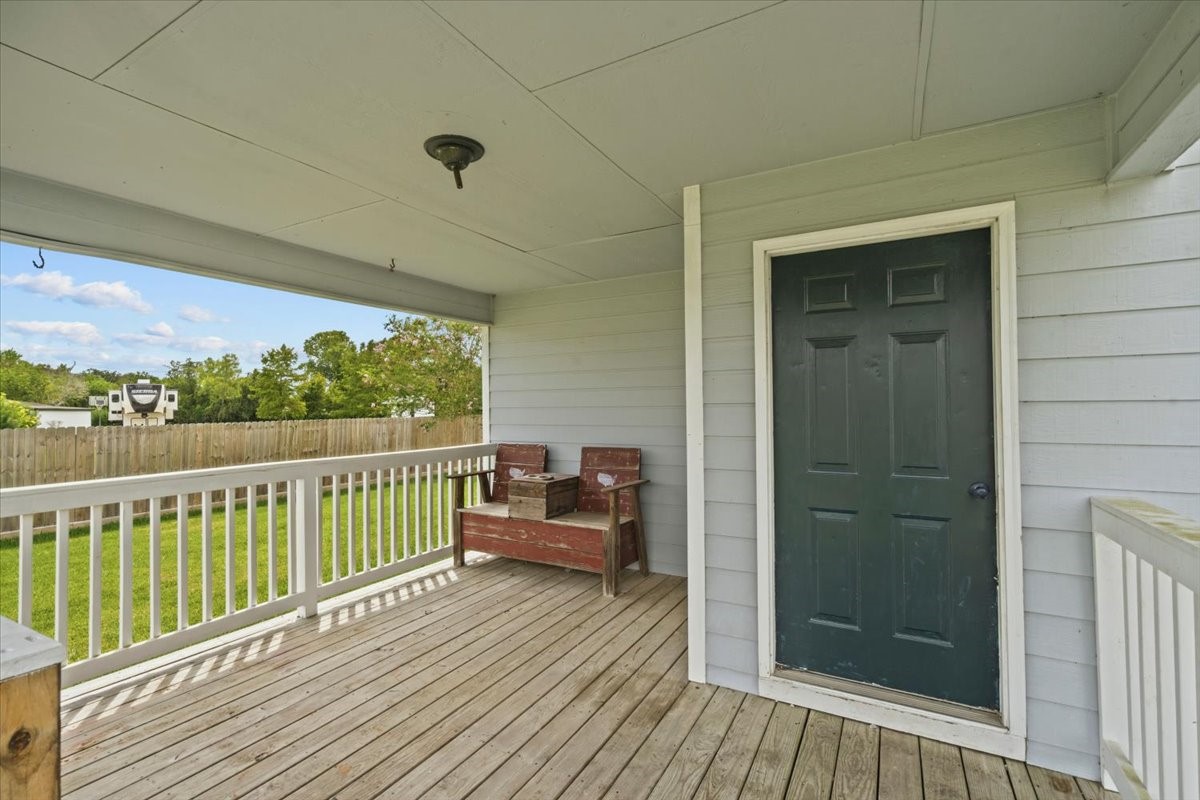 Front door and covered porch area. Front door and covered porch area.