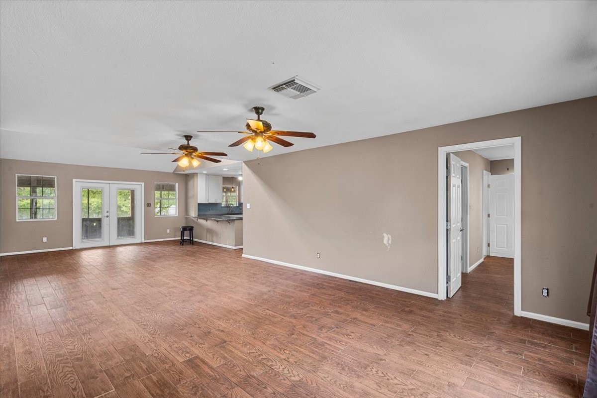 Dining room area with french doors to the screened porch.