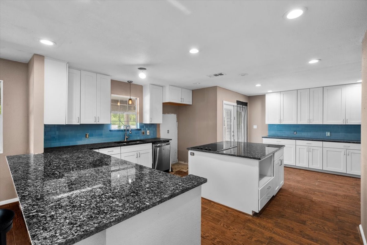 Large kitchen with plenty of counters and storage. Large kitchen with plenty of counters and storage.