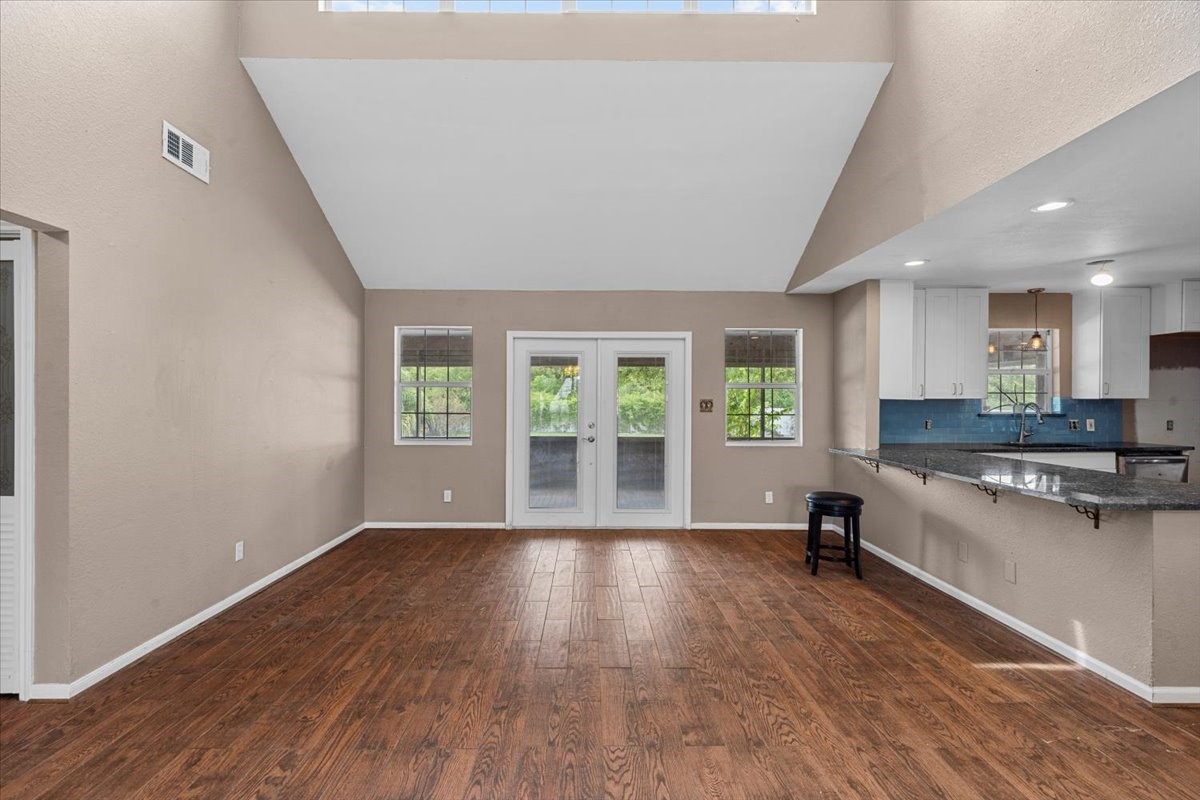 Dining room area with breakfast bar in kitchen.
