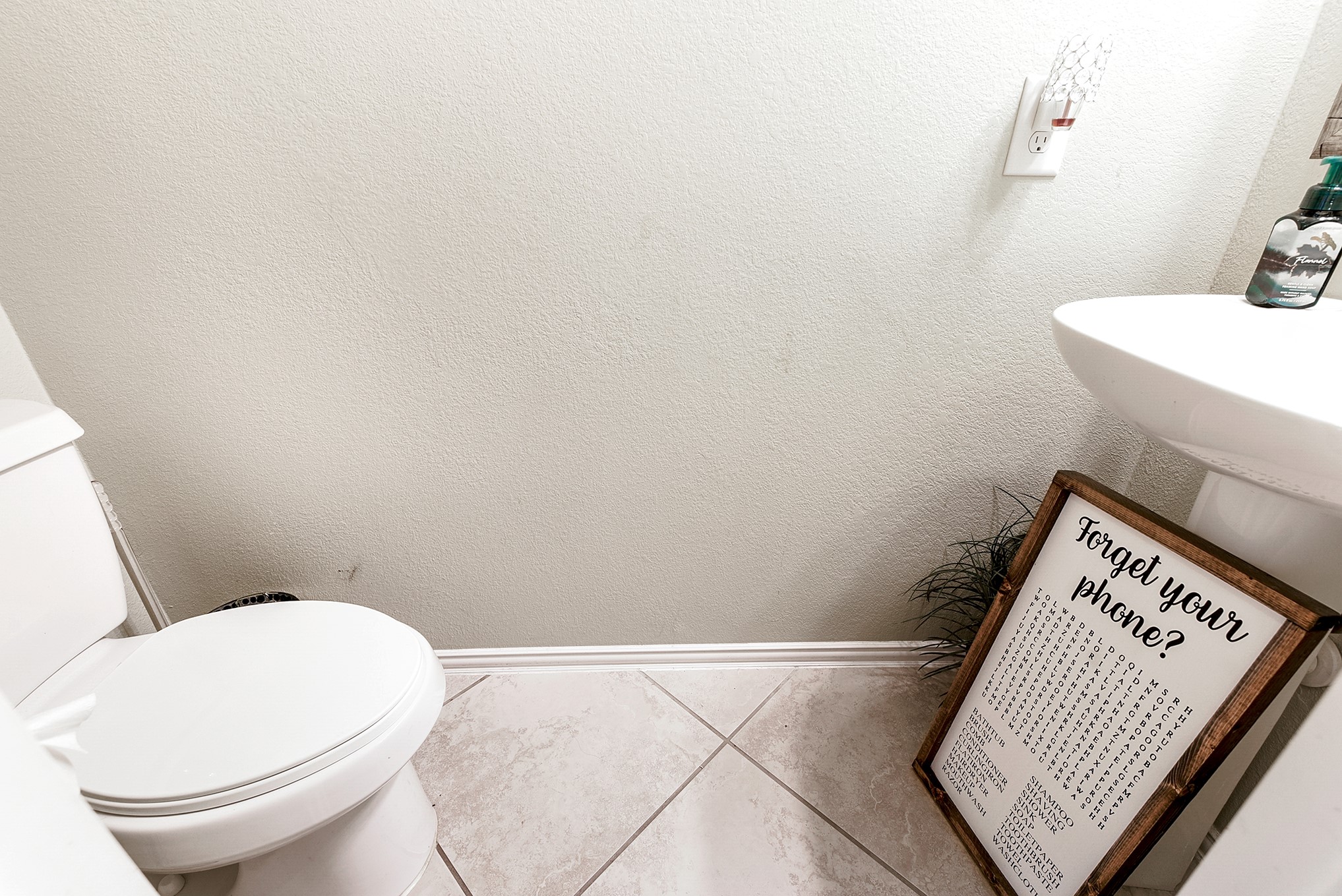 Downstairs, you'll find a powder room, perfect for guest use.
