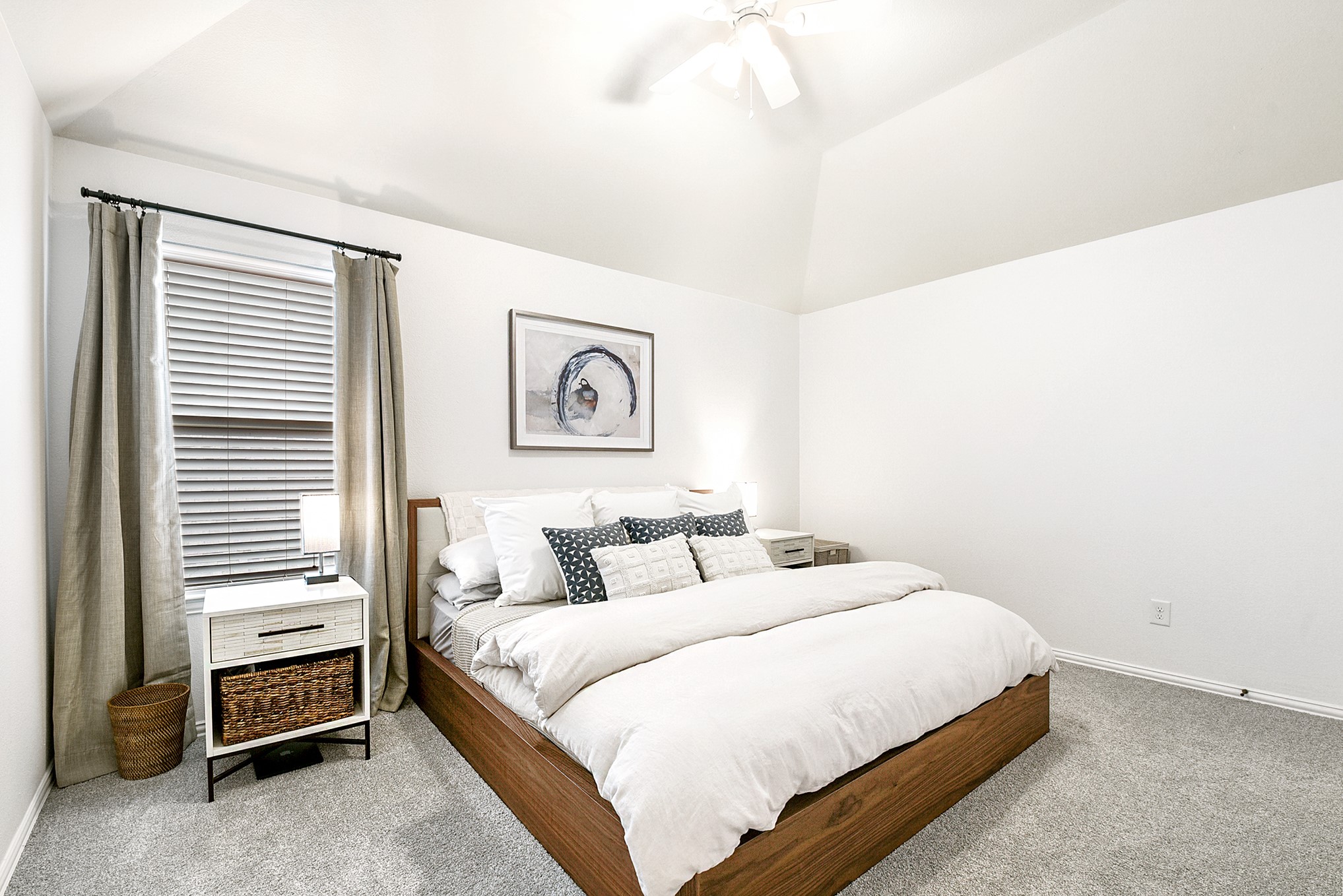 Upstairs offers three additional guest bedrooms, each generously sized with ample closet space. Take note of the large bedroom set that fits comfortably in one of the rooms, highlighting the spaciousness.