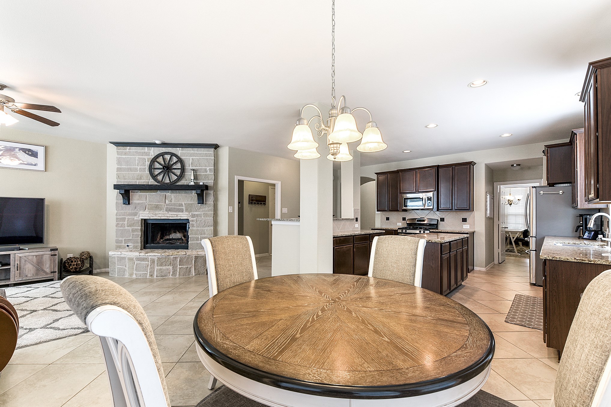 The spacious and open breakfast room can accommodate a larger dining table, perfect for hosting gatherings or enjoying meals with family. With its ample size, this room also offers views into the home, creating a welcoming and inclusive atmosphere.