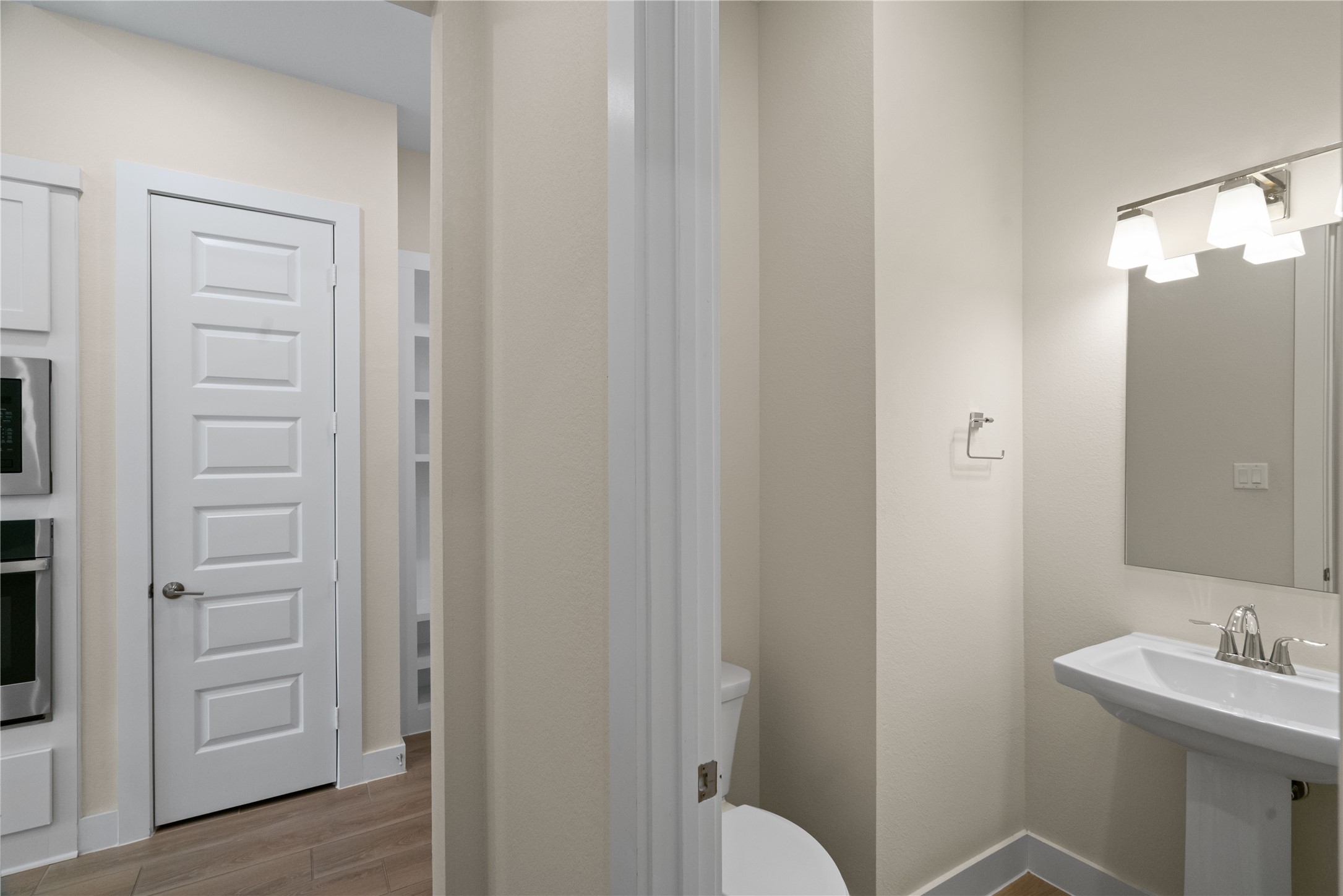 Half bath near the laundry room.