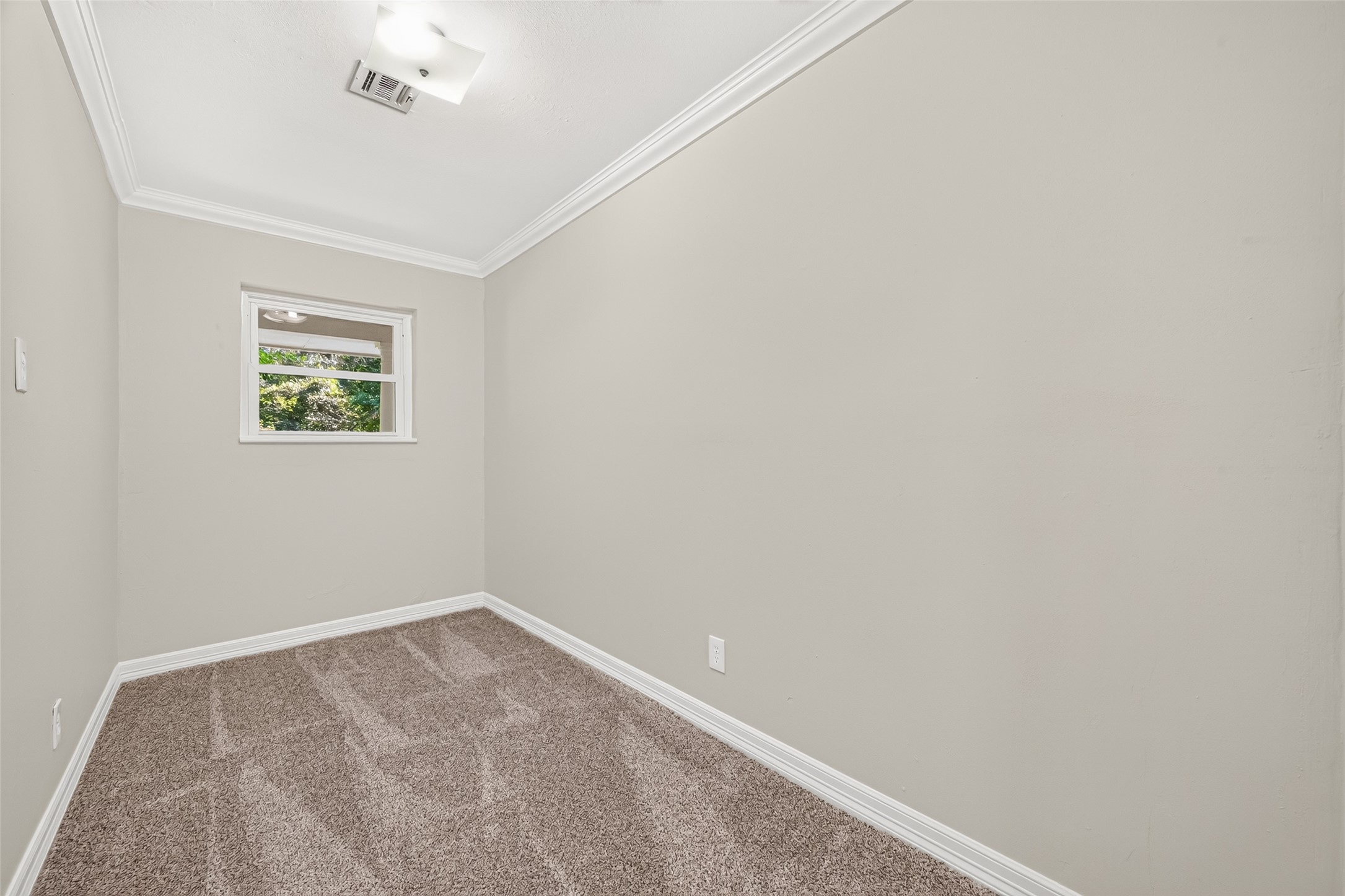 This is an extra room that can be used for extra storage space, a tiny office, or a craft room. The possibilities are endless.