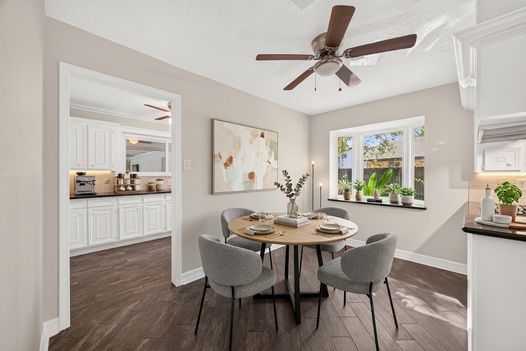 Virtually Staged. The cabinet above the coffee bar in the laundry room is not currently a part of the home.