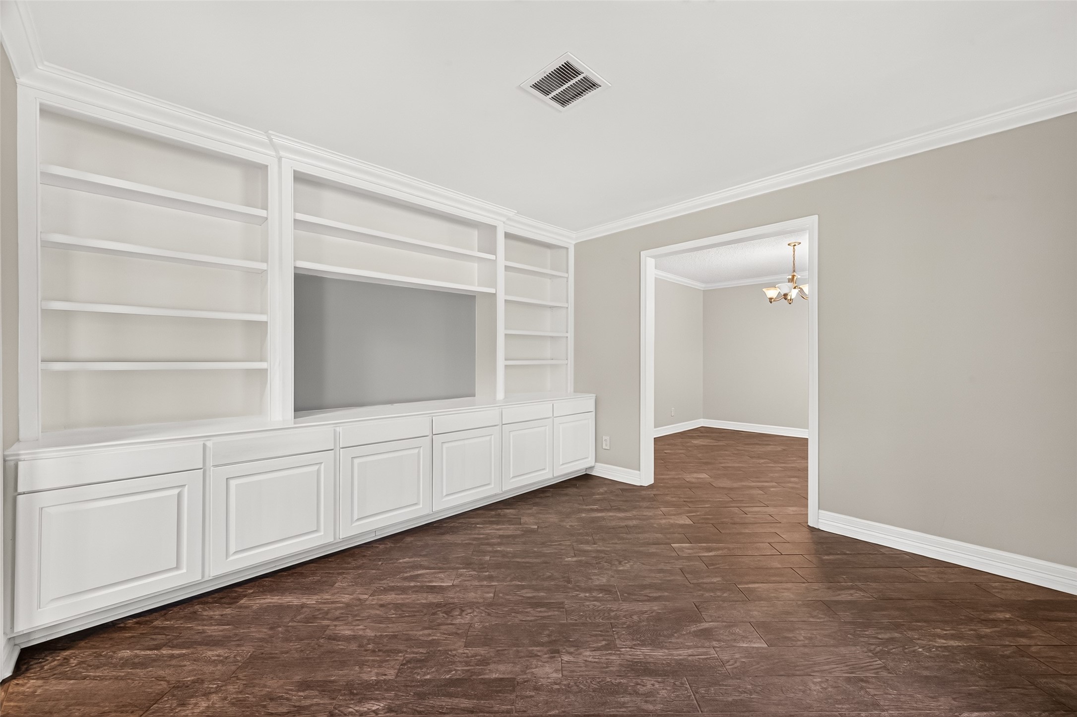 Alternate view of the study/library. Here you can see the custom built-in cabinetry and shelving.