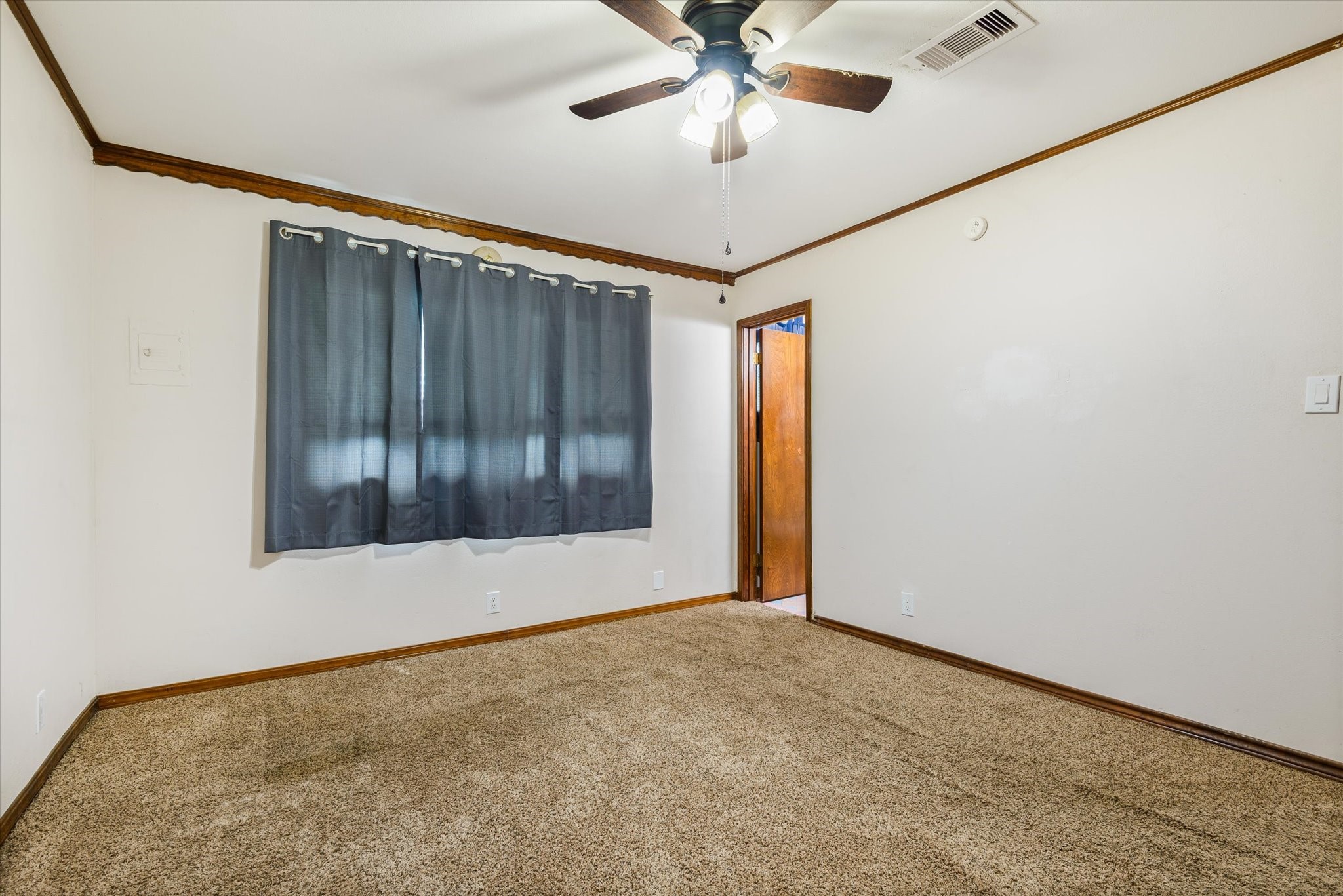 Primary bedroom with half bath