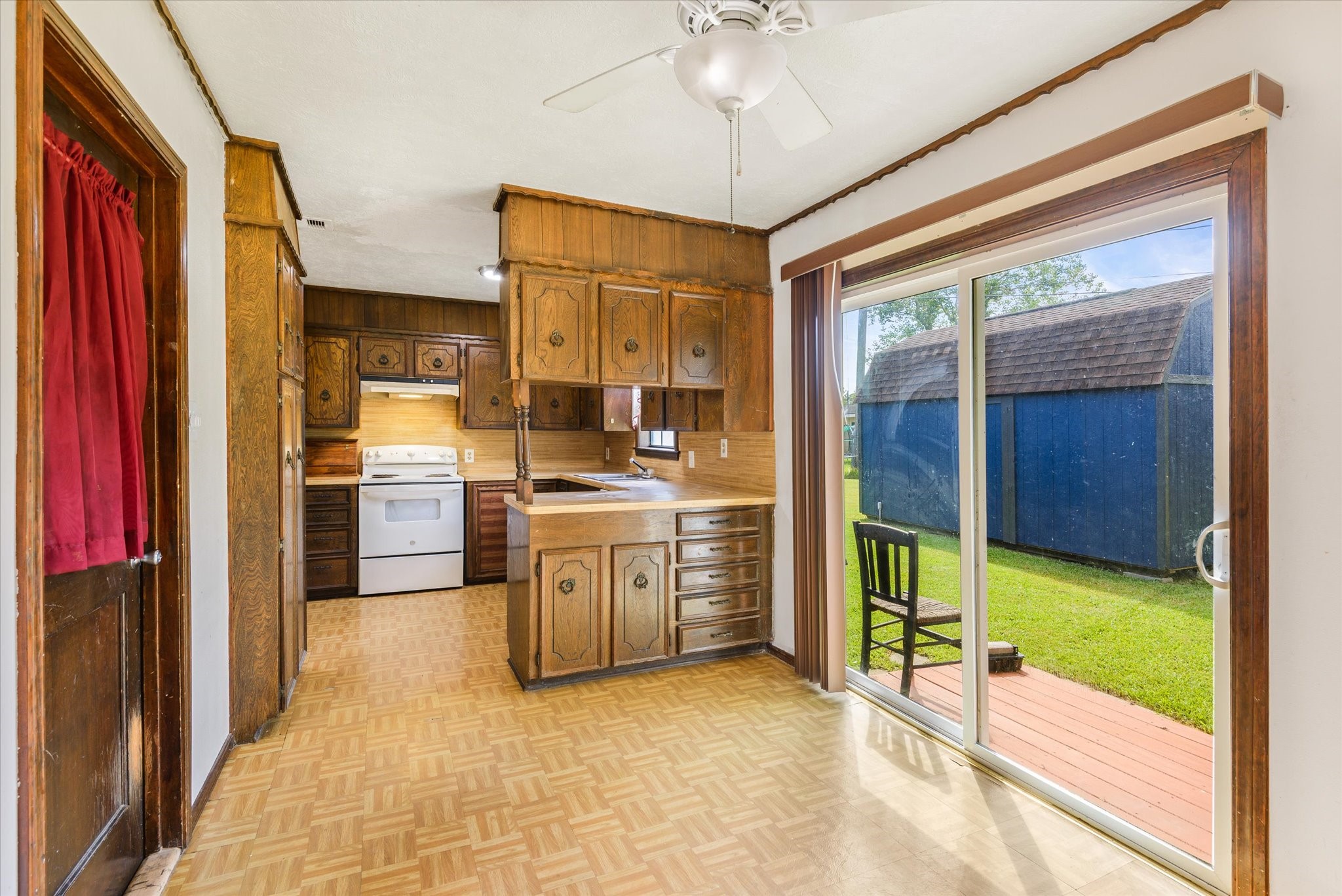 Dining room with large sliding door into backyard