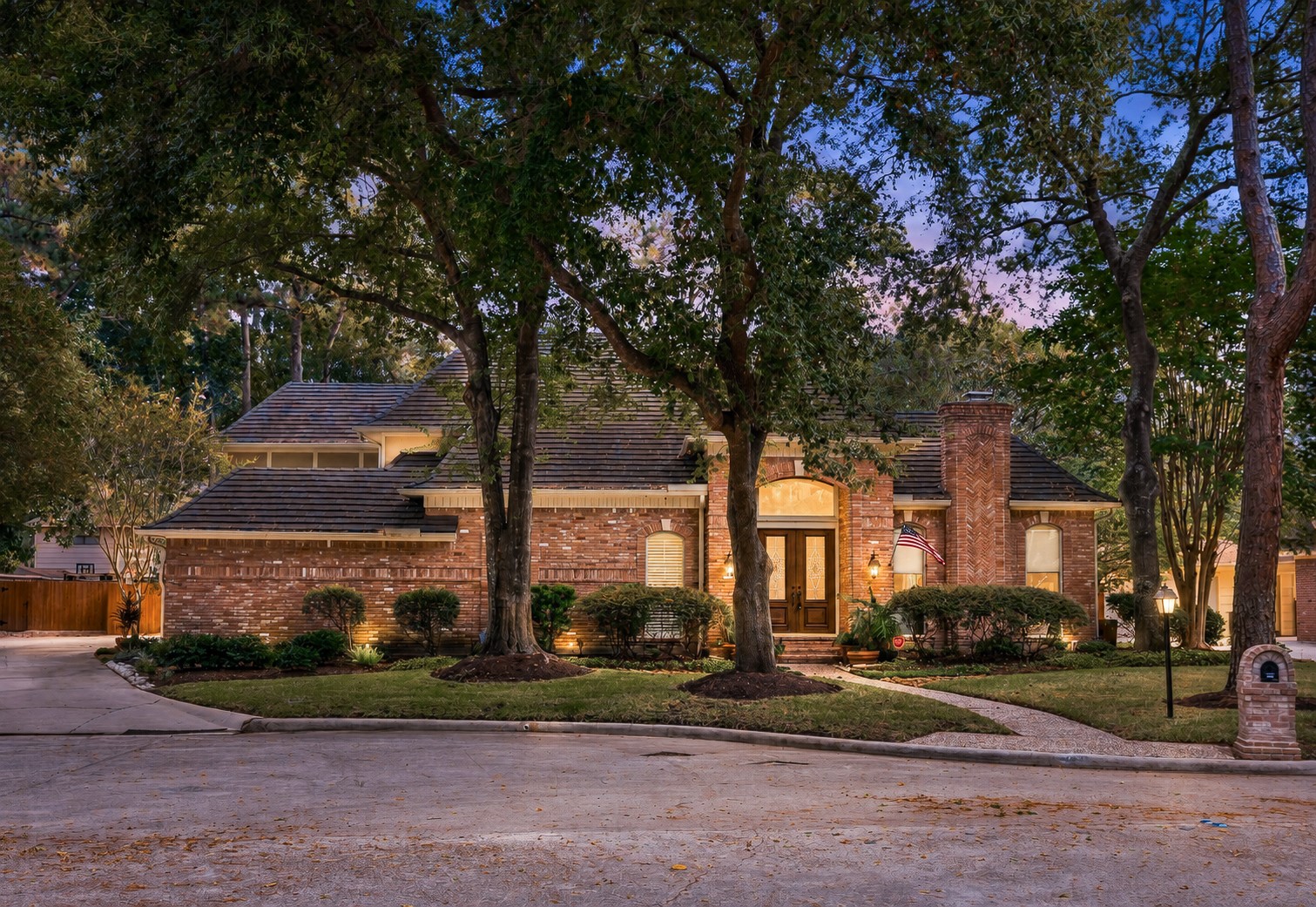 Set along a quiet Huntwick cul de sac, this gracious home pairs enduring curb appeal with thoughtful upgrades, including a tankless water heater and water softener.