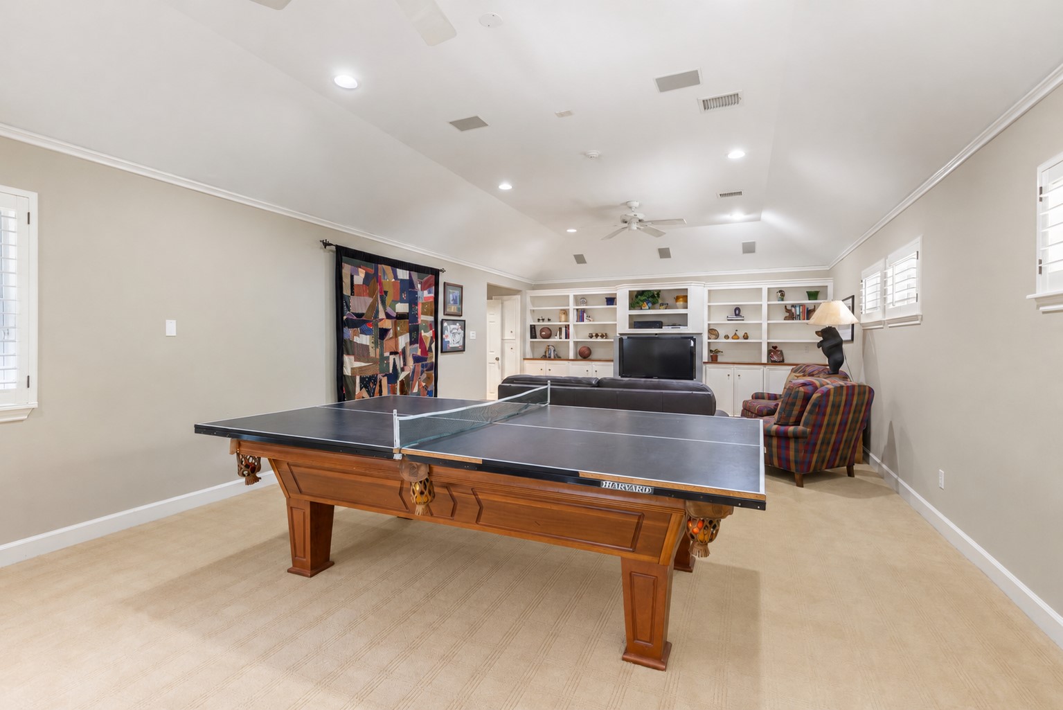 Impressive room dimensions provide flexibility for multiple recreation zones within the game room addition.