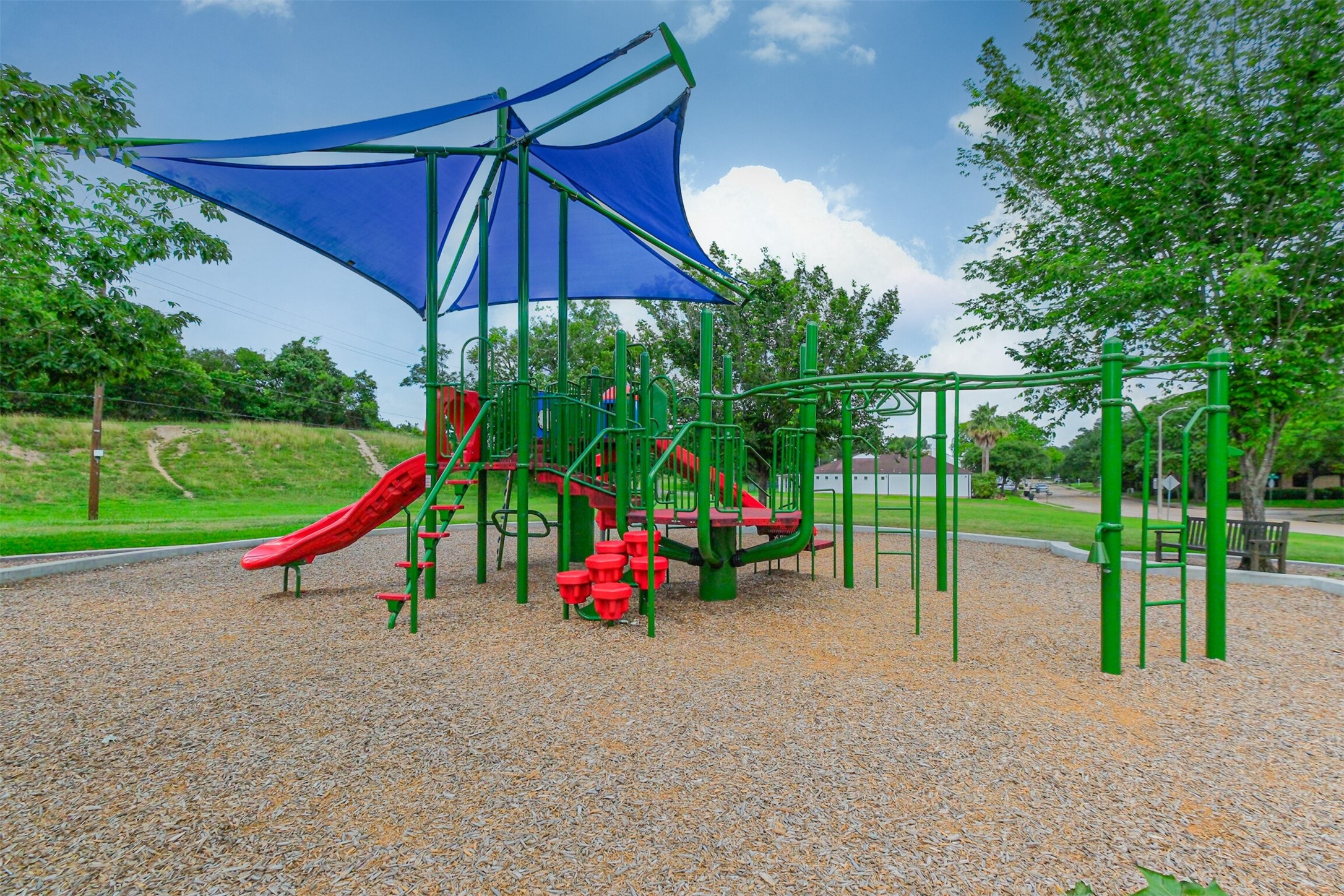 The playground is next to a big field where you can picnic, kick a soccer ball around, play tag, etc.