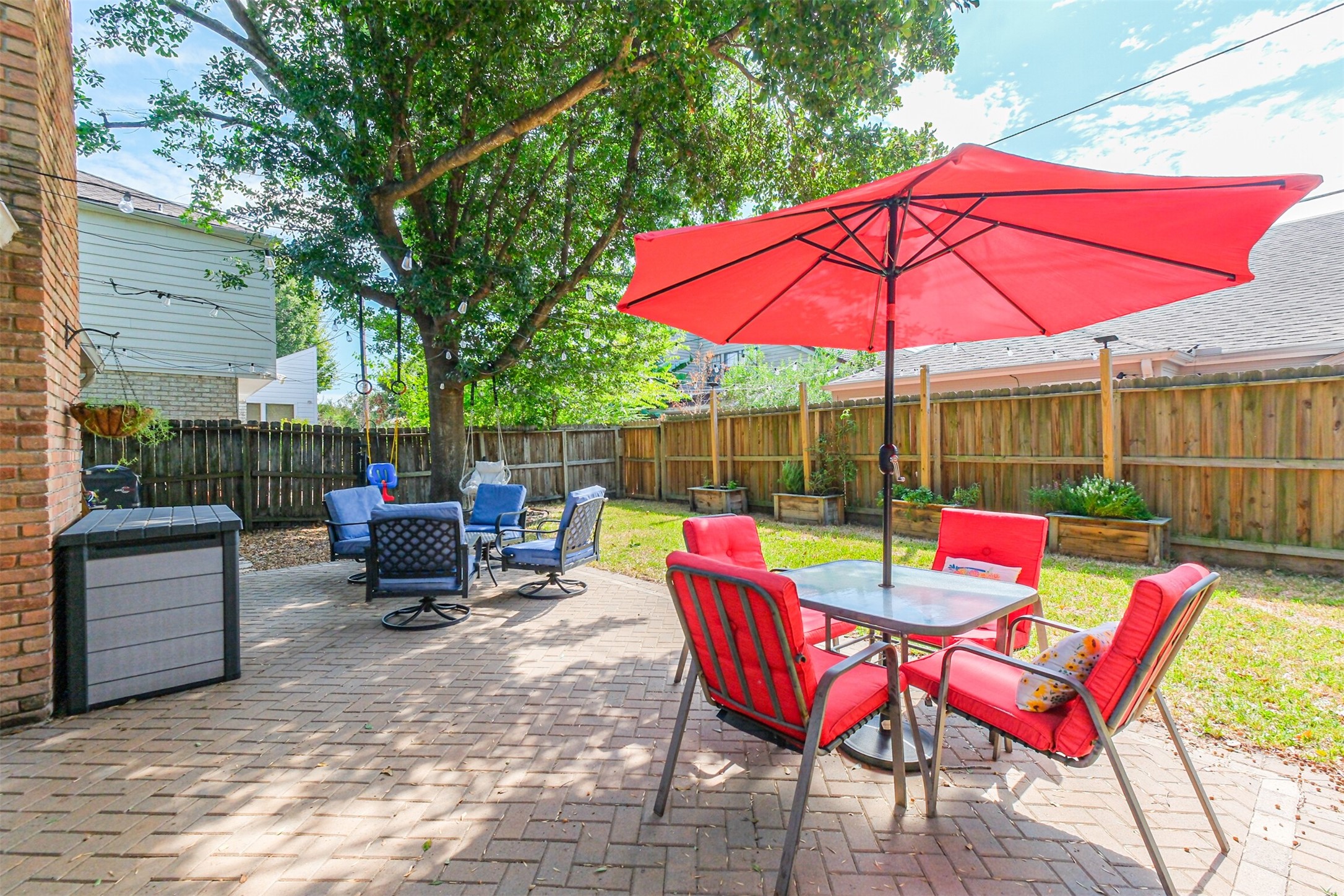 Out back is a patio with stone pavers where you can enjoy this beautiful Fall weather!
