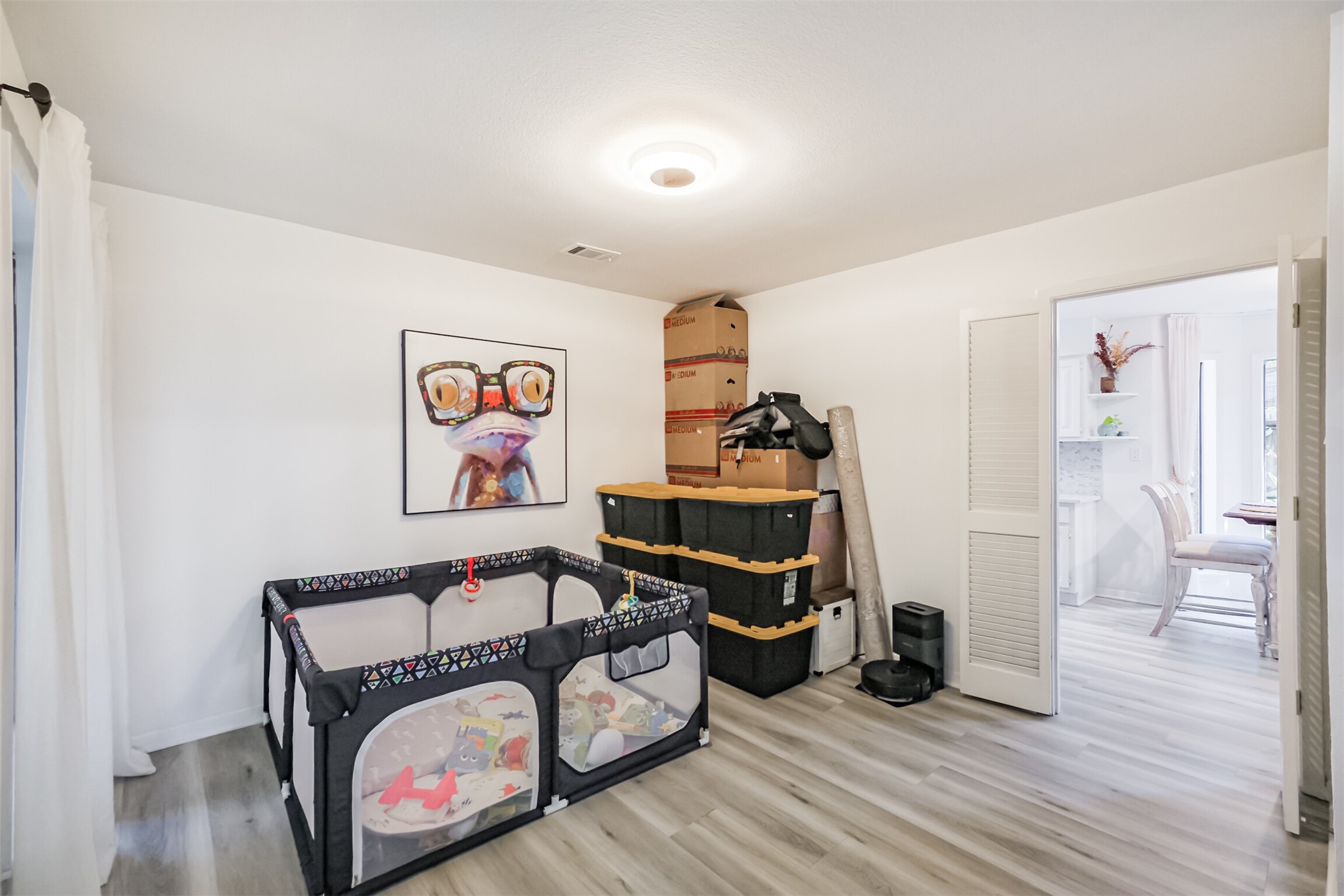 This room is the true dining room area but can also be used as a play room or study/office.