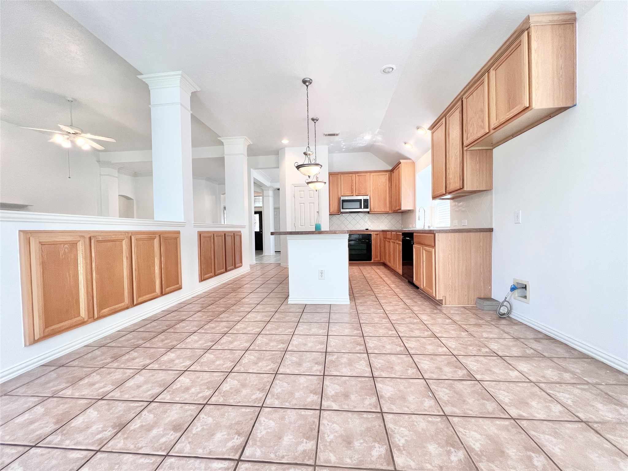 Kitchen also has a Serving bar open to the Family room and plenty of cabinets to keep your serving dishes.
