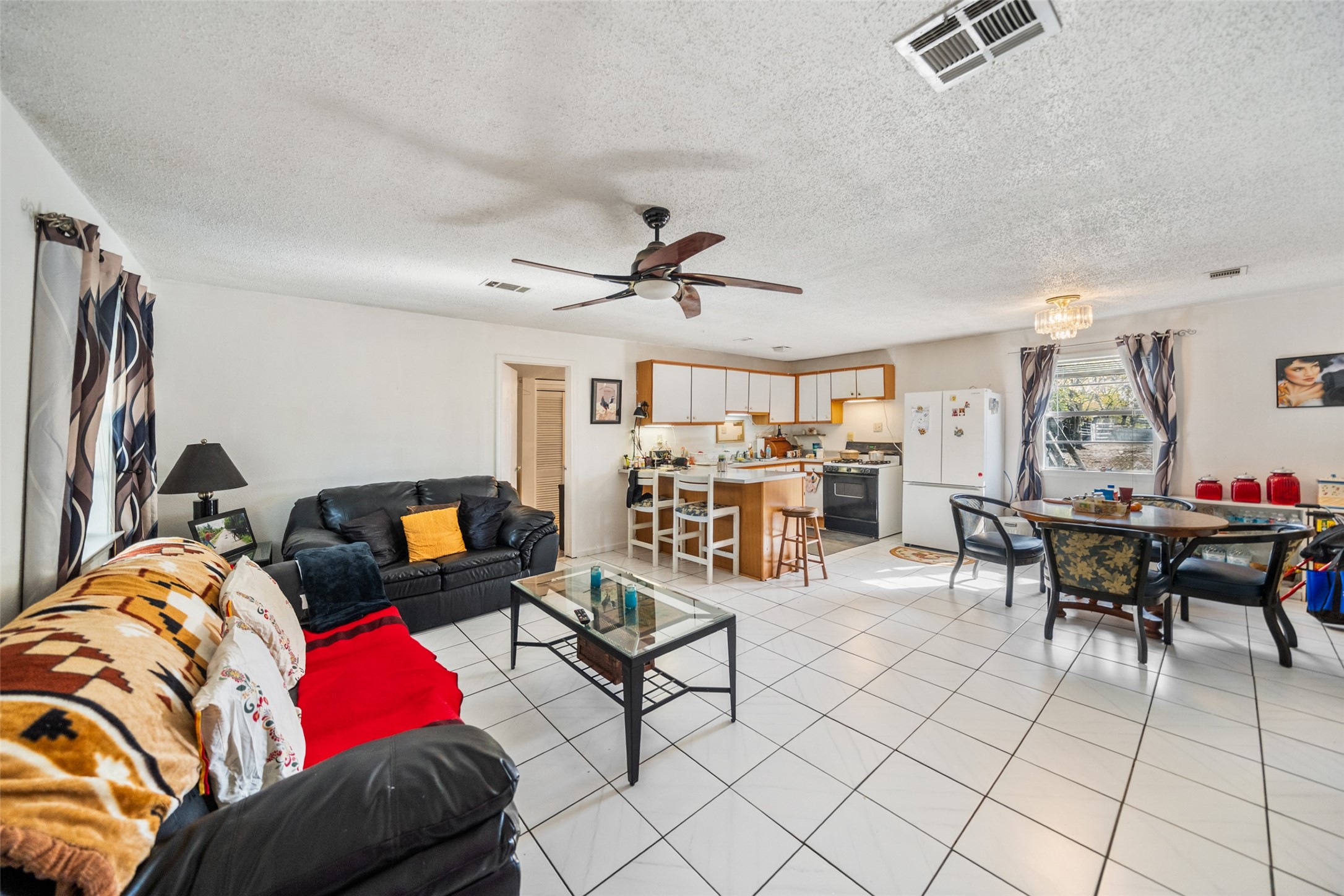 Upon entering, you will notice the open concept living, dining and kitchen. Great use of space