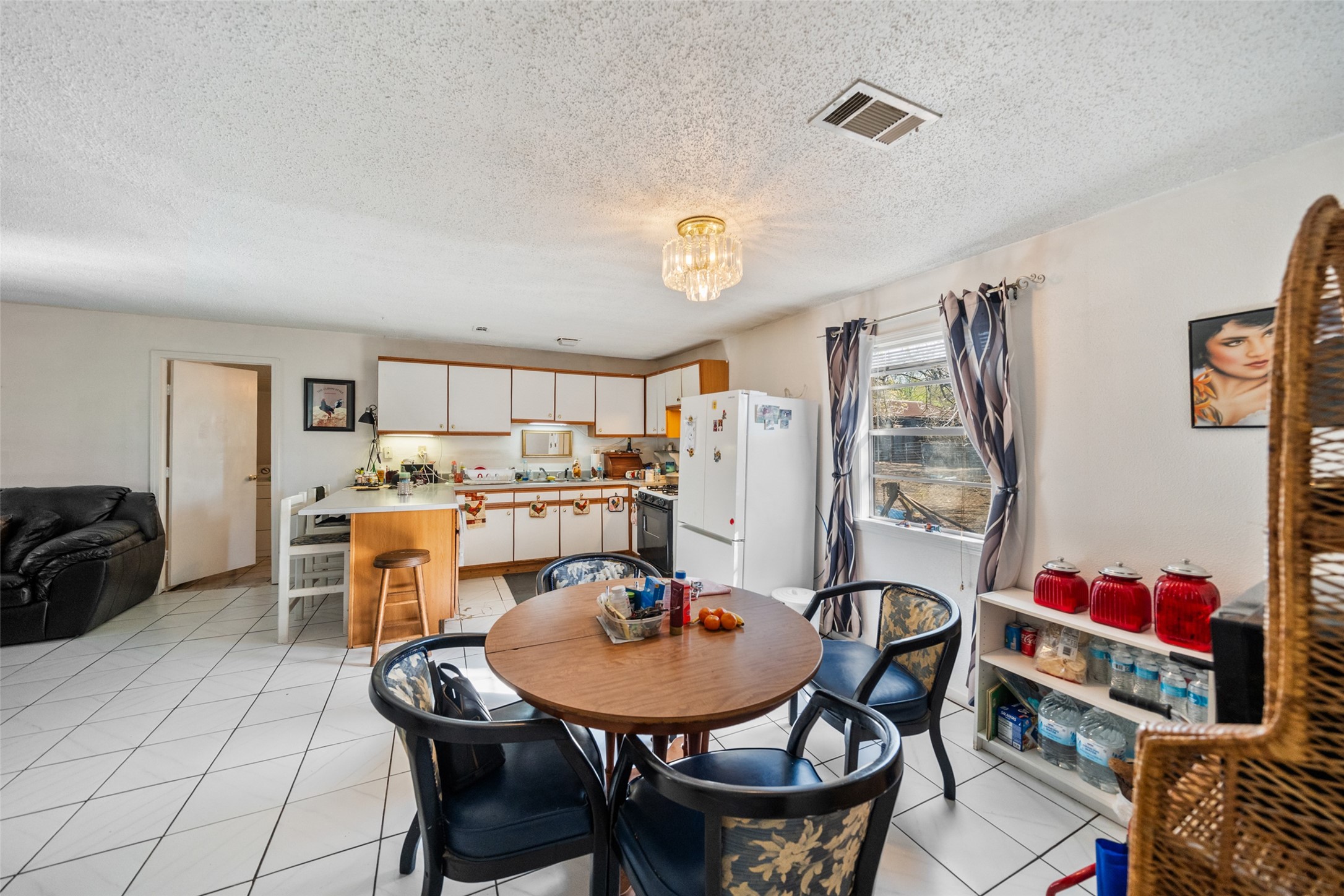 Dining area/breakfast nook. Tile flooring