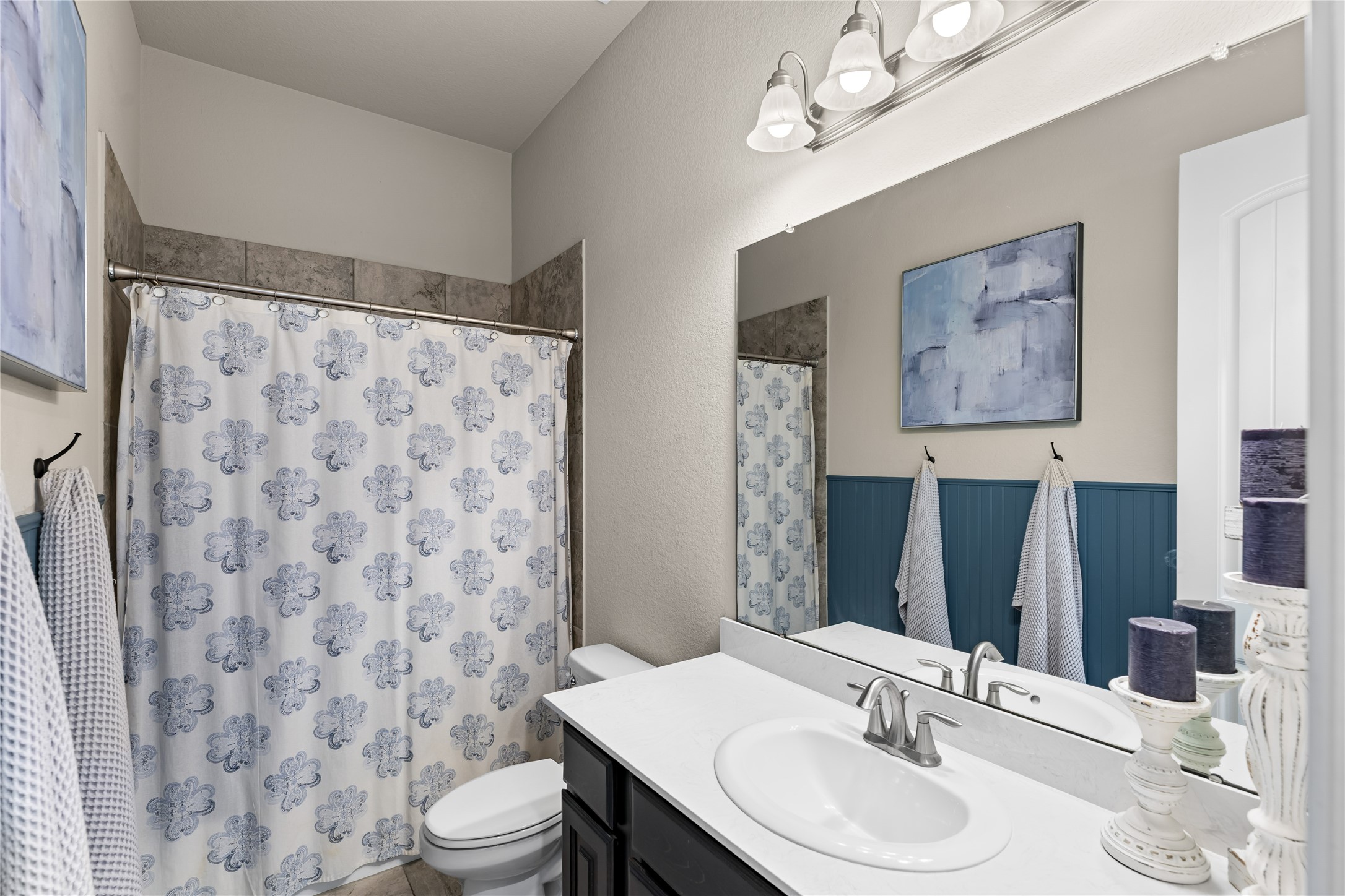Third full bathroom shared between two bedrooms