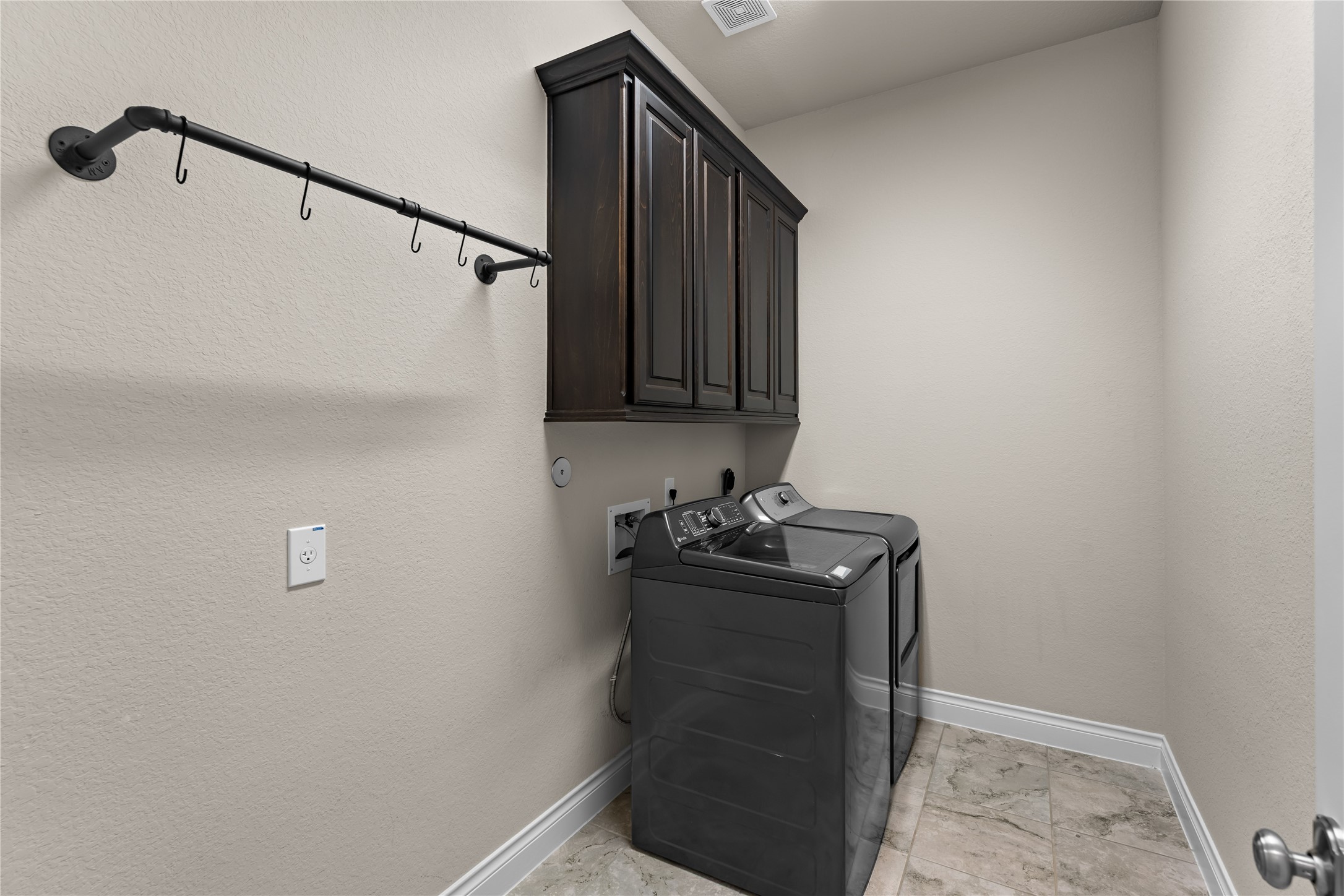 Utility room right off the three car garage