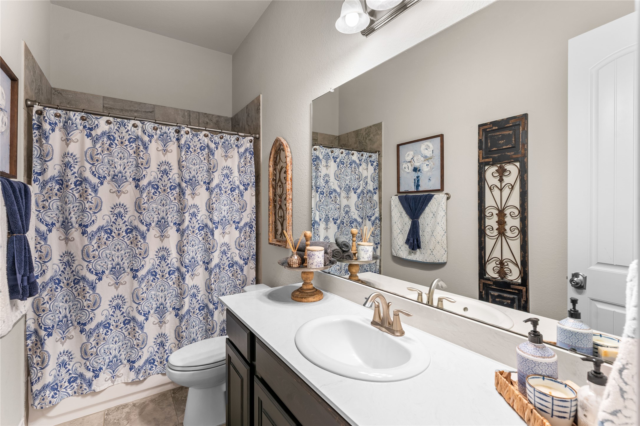 Secondary bathroom with updated finishes and functional layout.