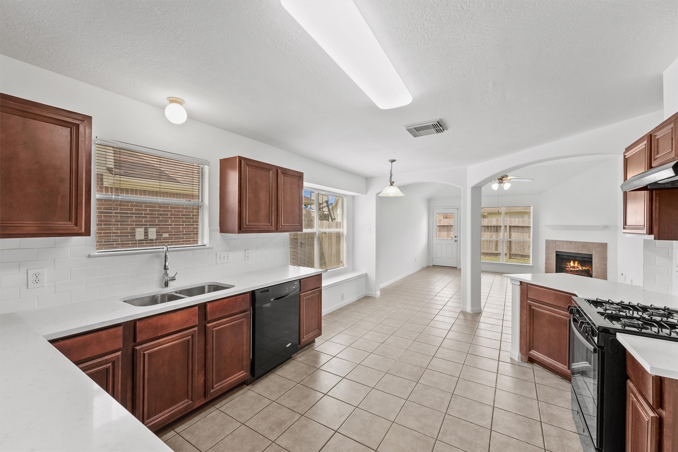 New countertops and open concept living are ready for daily life and entertaining. New countertops and open concept living are ready for daily life and entertaining.